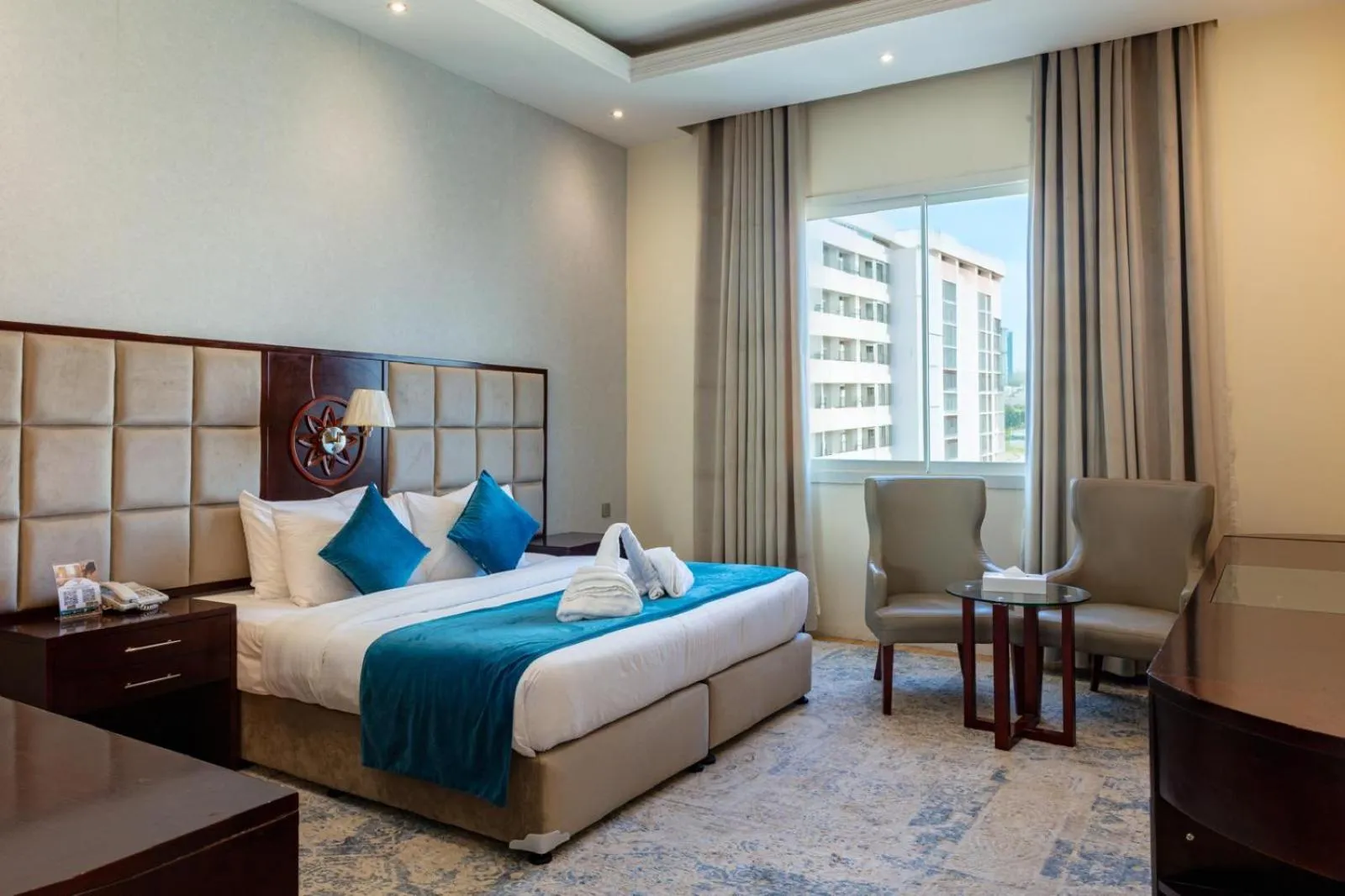 Bed in Palm Inn Hotel Doha