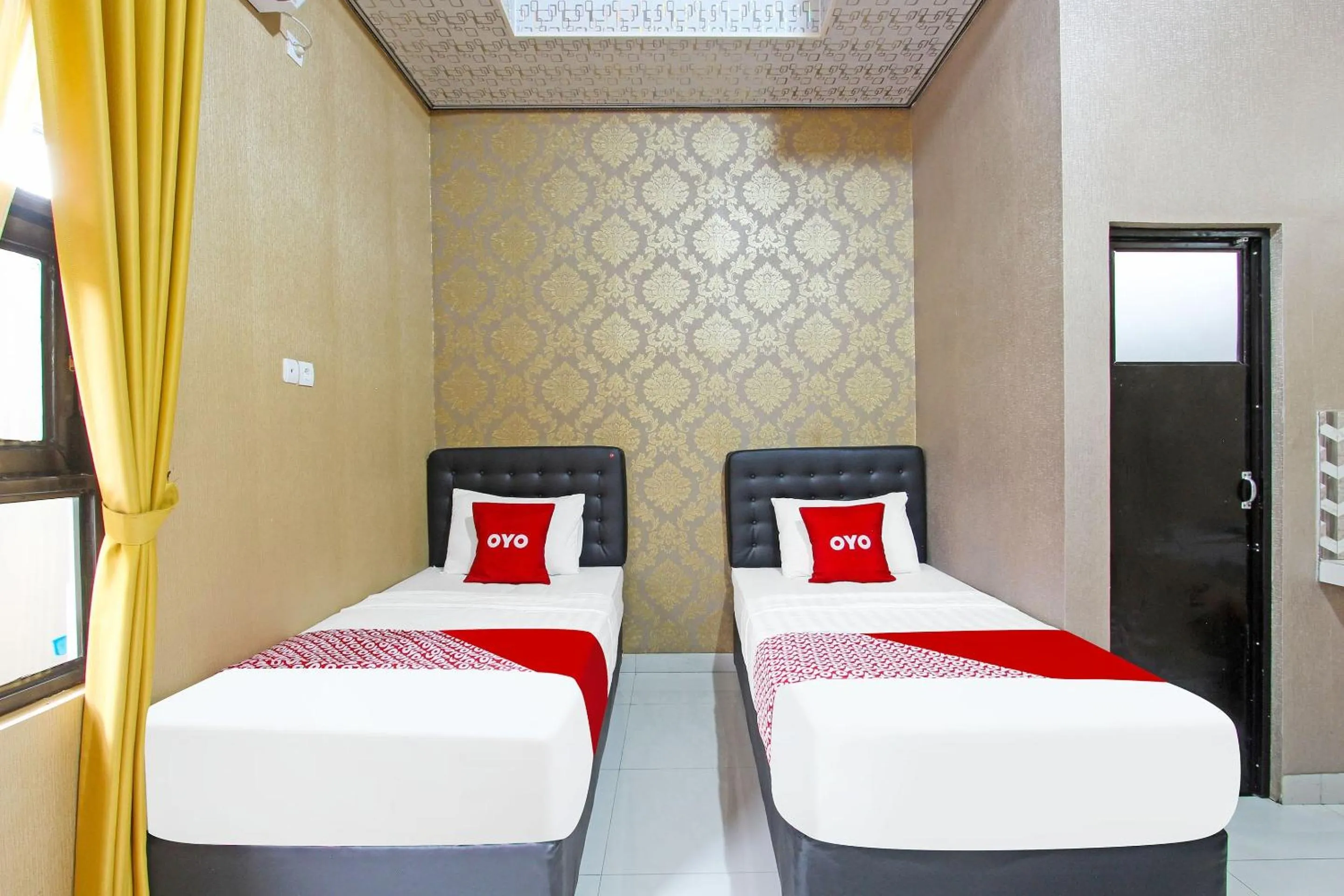 Bedroom in OYO 91842 Tahesa Guesthouse Syariah