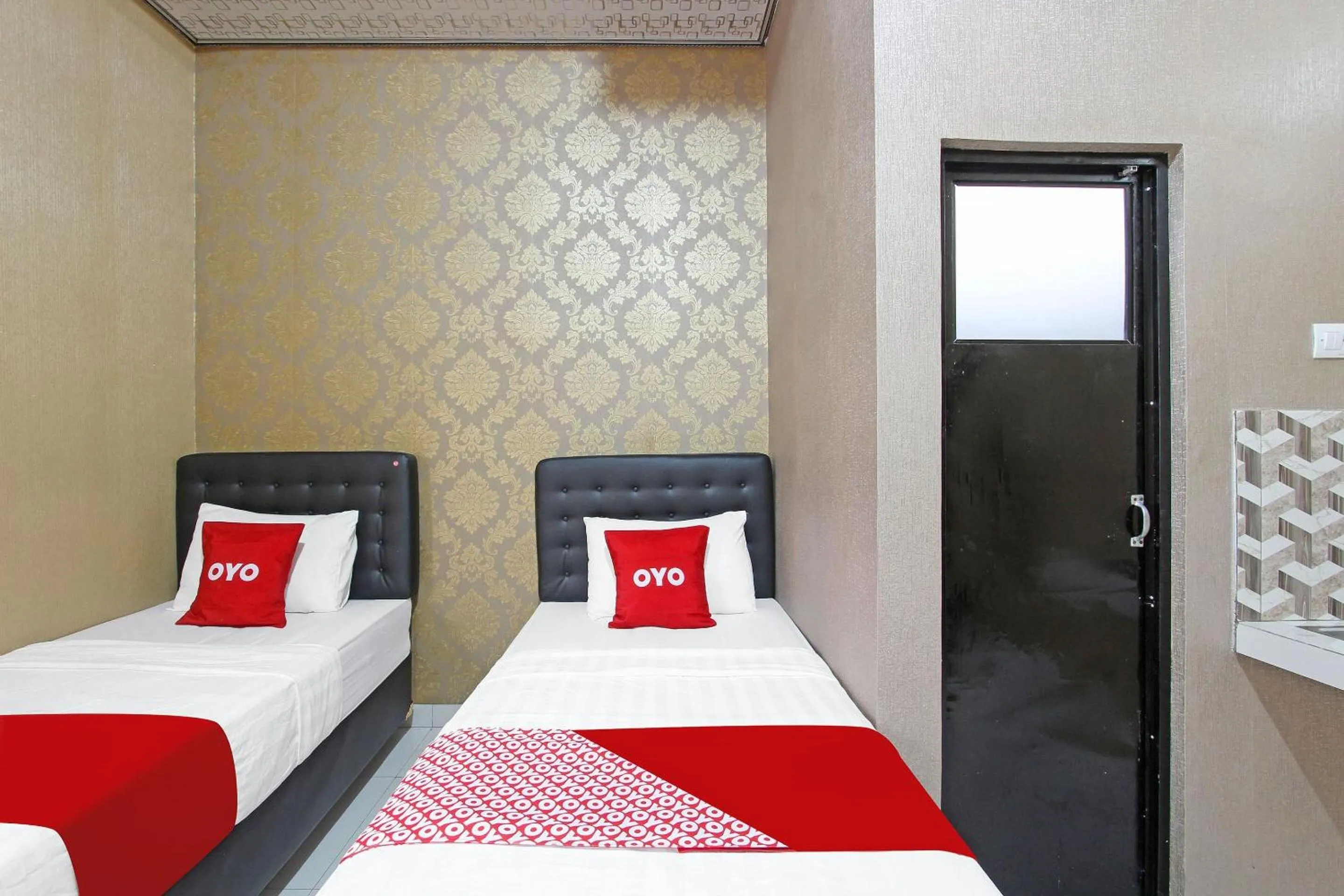 Bedroom in OYO 91842 Tahesa Guesthouse Syariah