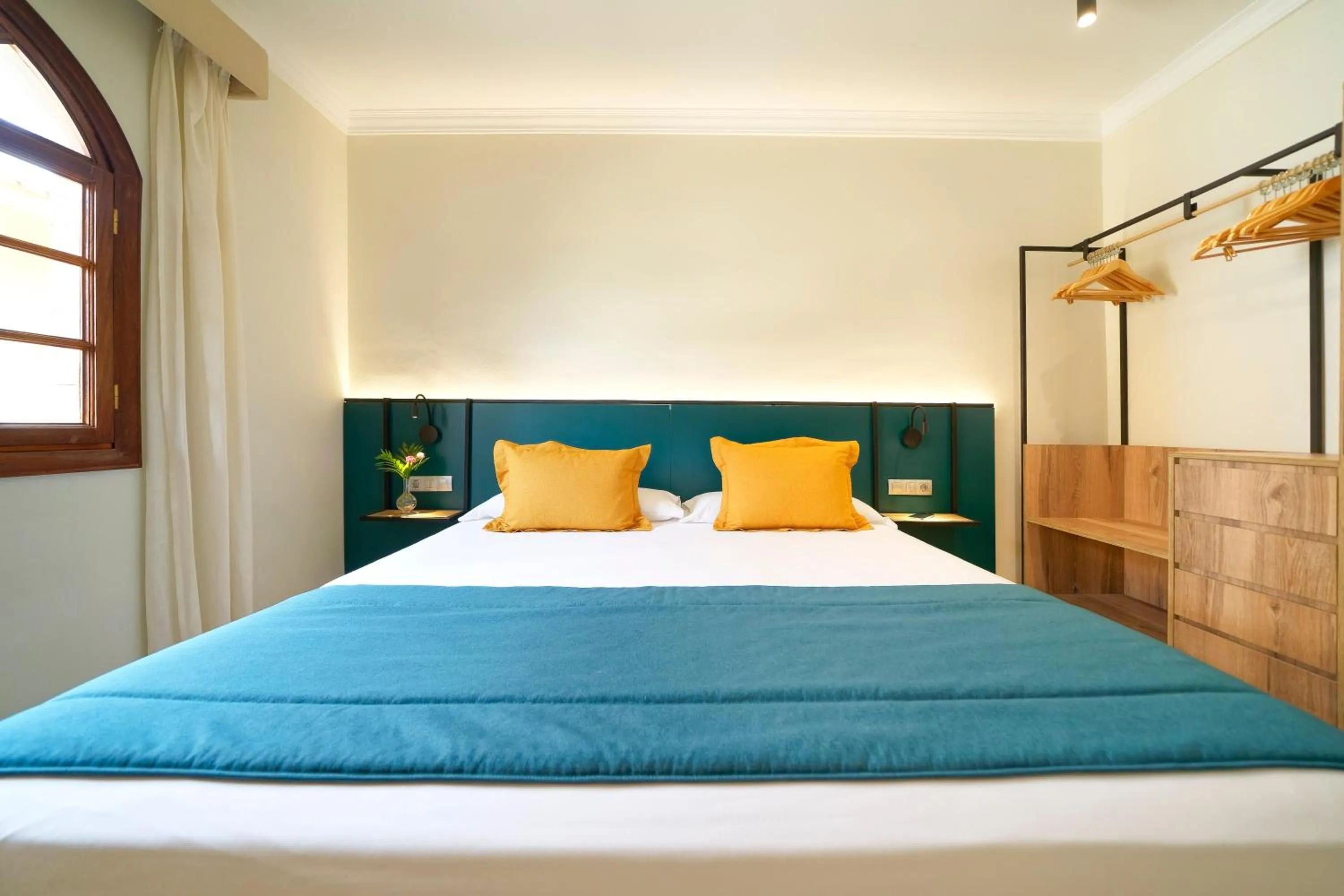 Photo of the whole room, Bed in Suites & Villas by Dunas