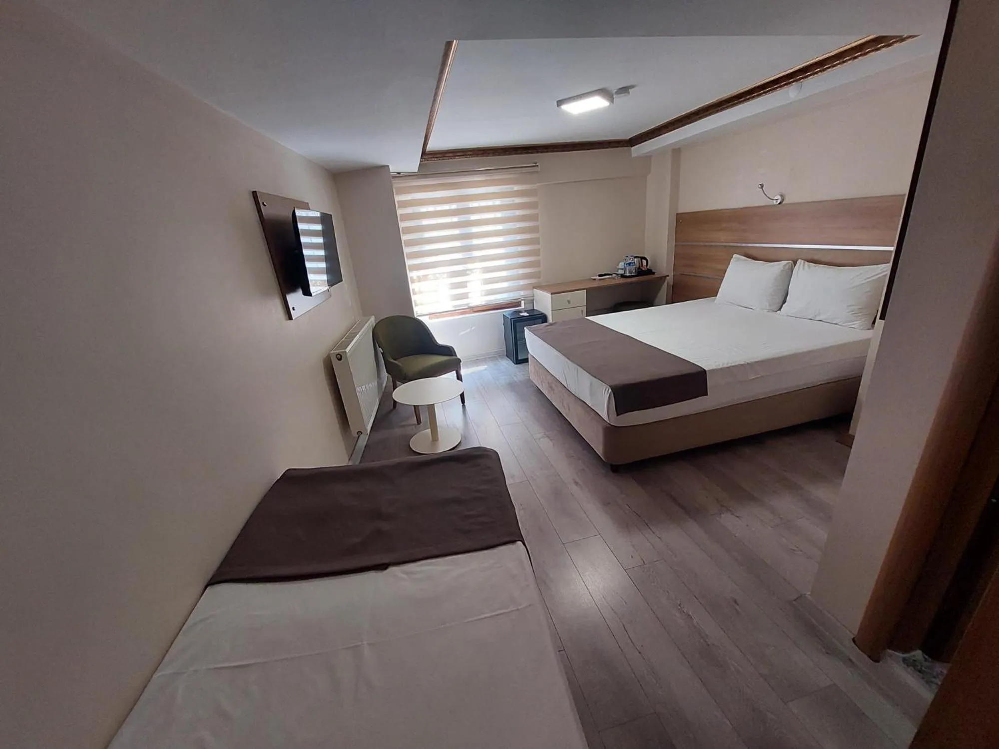 Bed in BEYAZ İNCİ OTEL