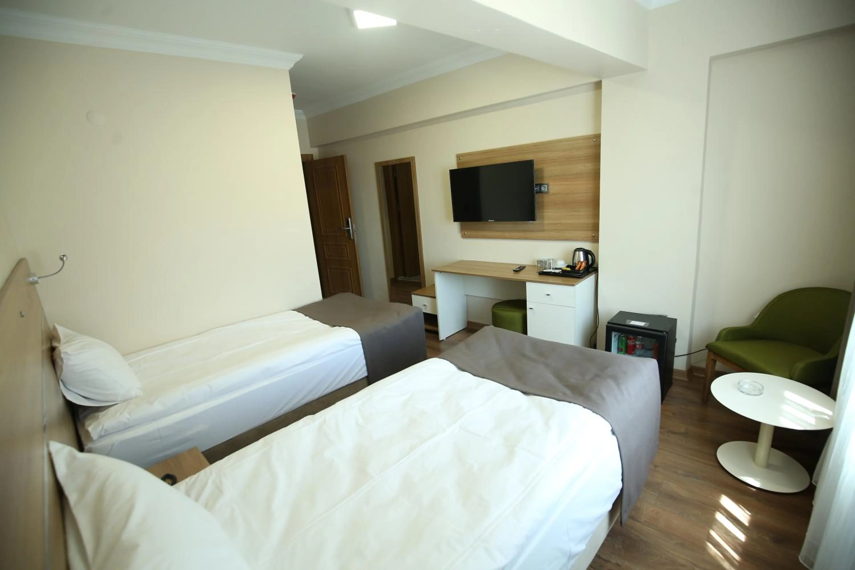 Bed in BEYAZ İNCİ OTEL