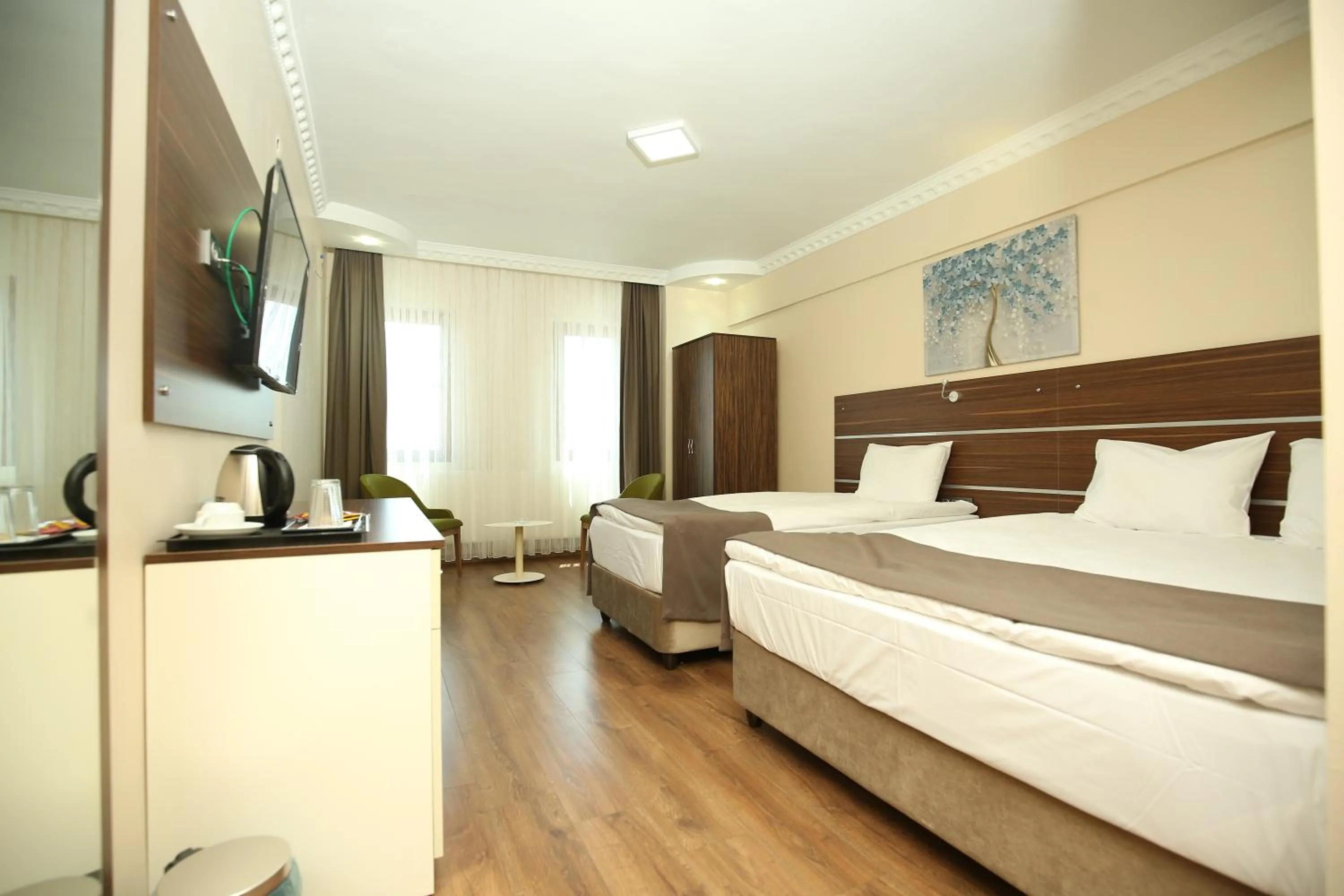 Bed in BEYAZ İNCİ OTEL