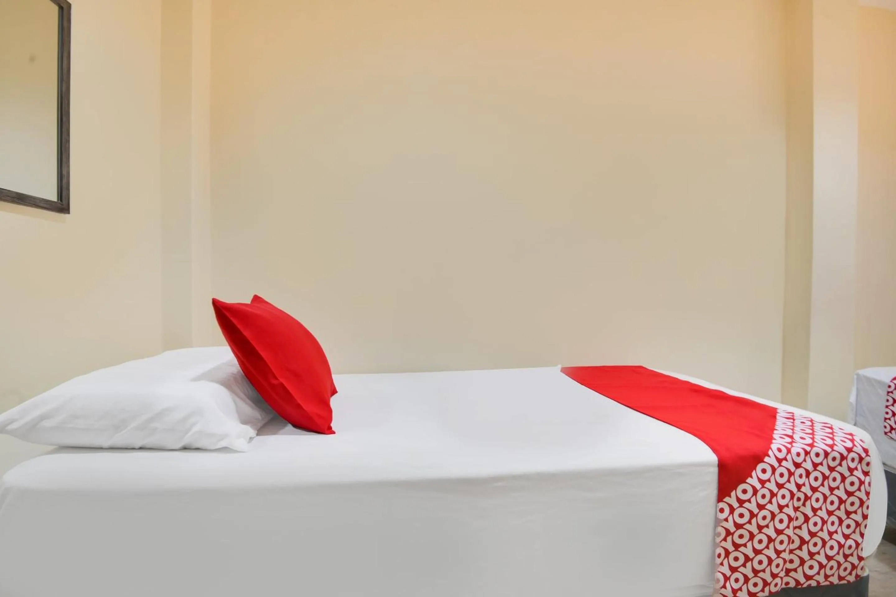 Bedroom in OYO 912 Fb Suites