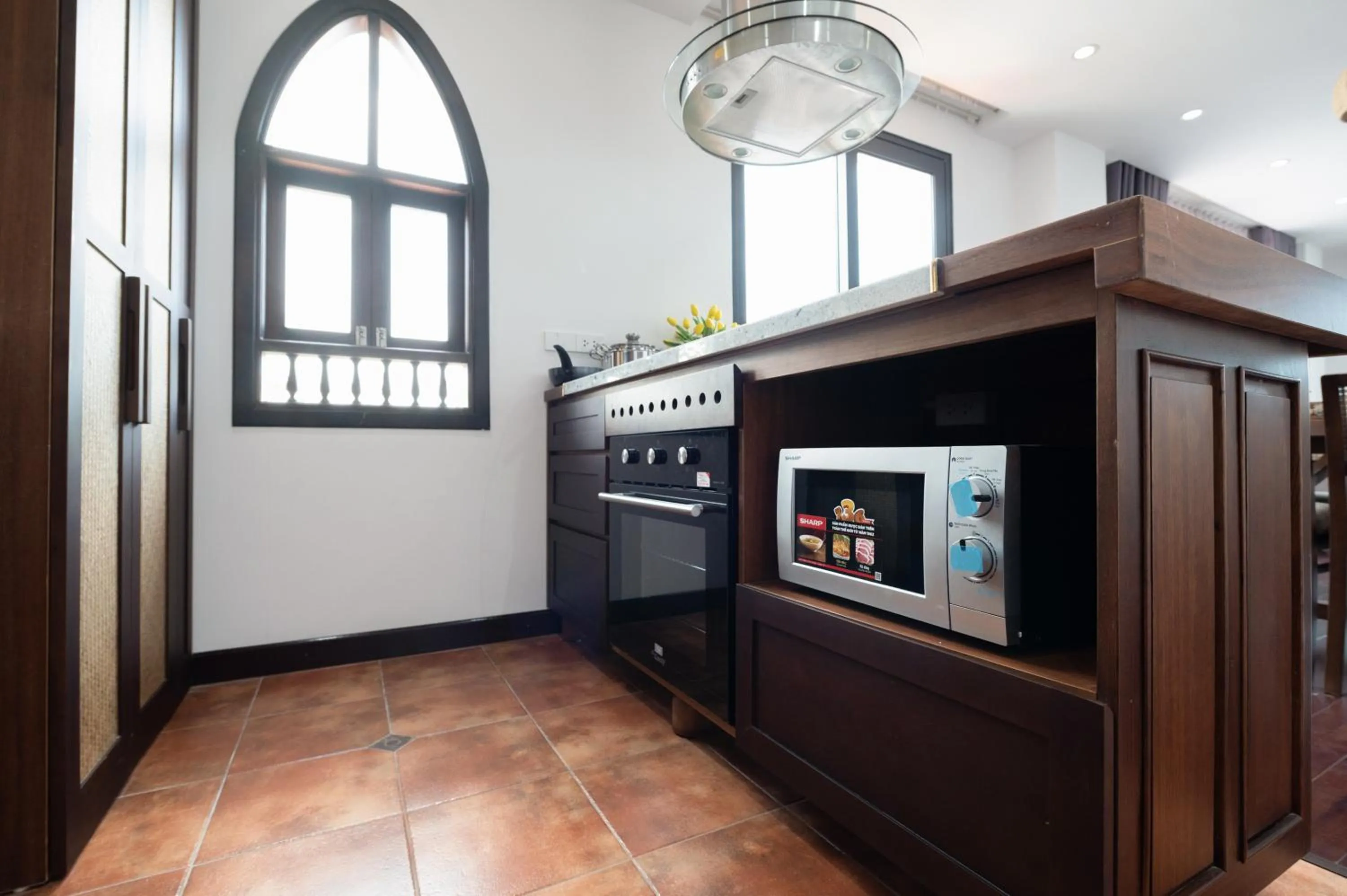 Kitchen or kitchenette in FLESTA Doi Can Serviced Apartment