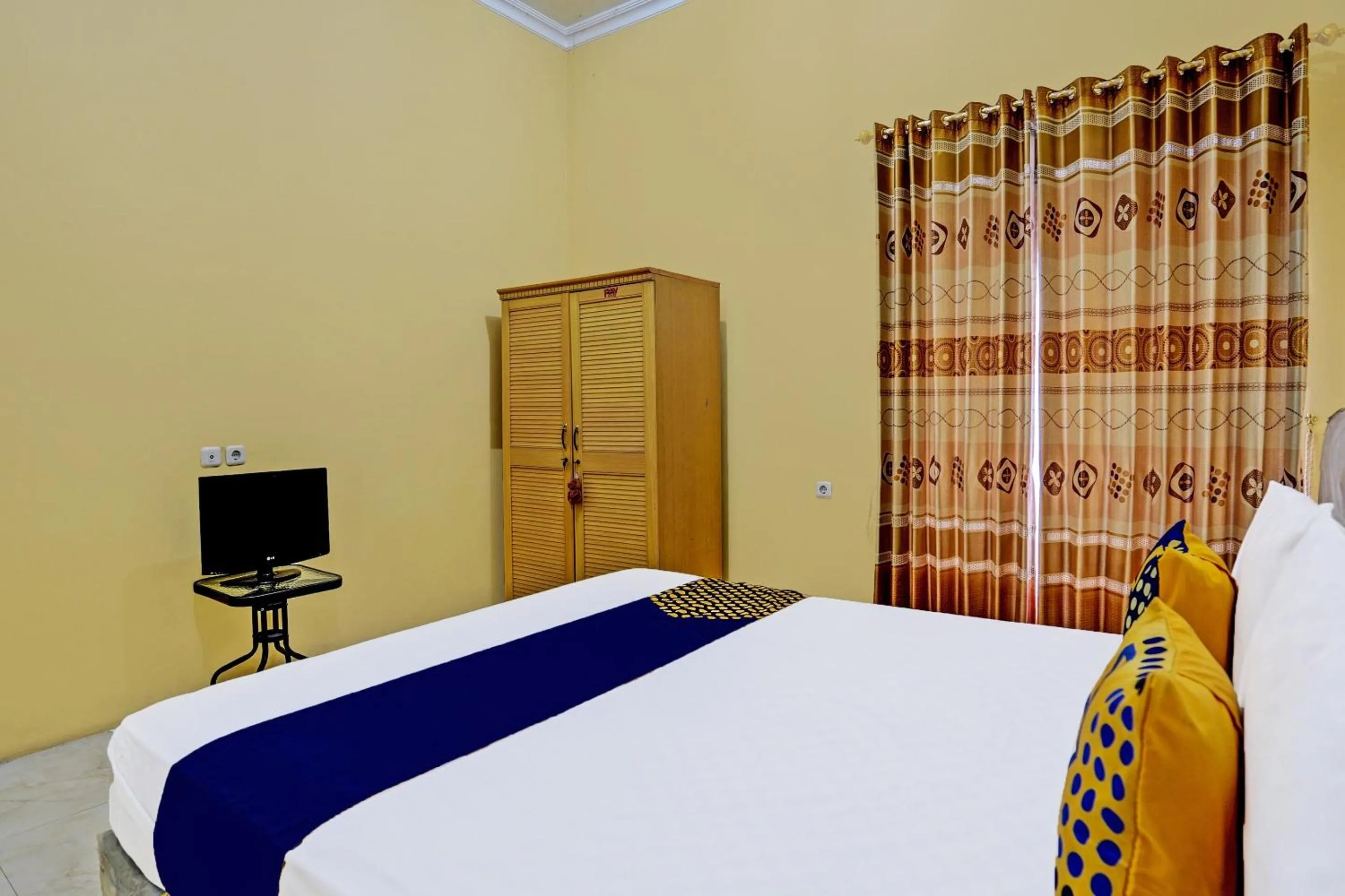 Bedroom in Hotel O Raffa Residence Syariah