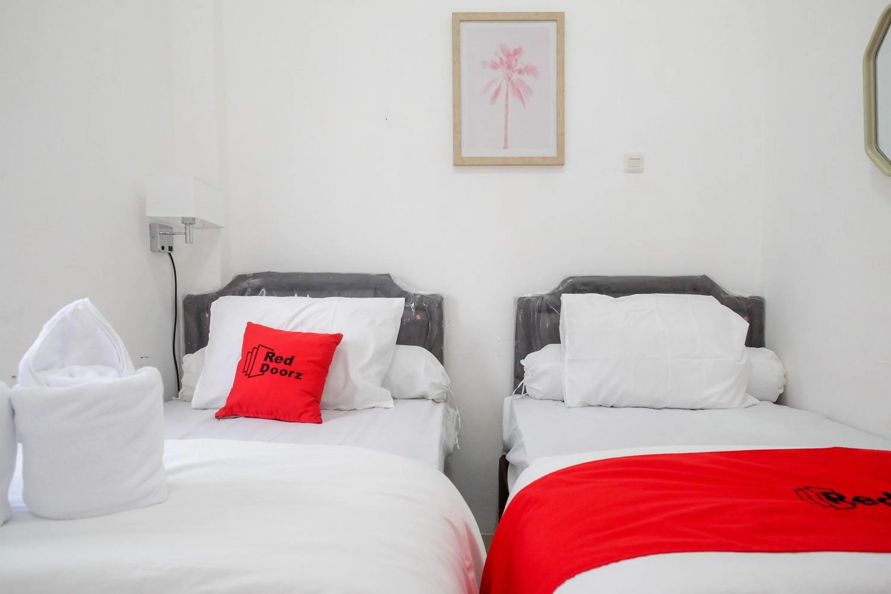 Bed in RedDoorz Plus At Lovina Inn Tonrangeng River Side