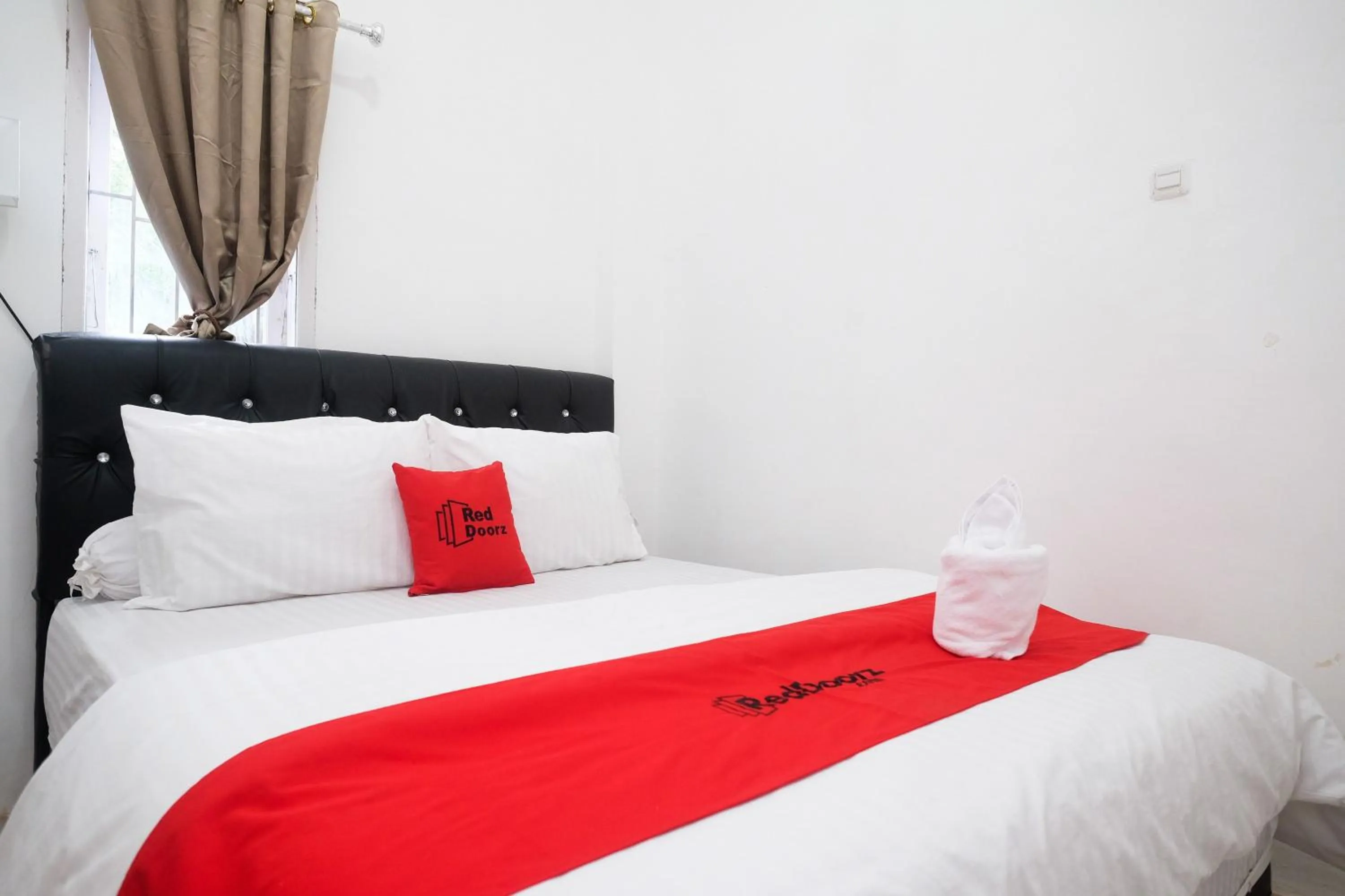 Bed in RedDoorz Plus At Lovina Inn Tonrangeng River Side