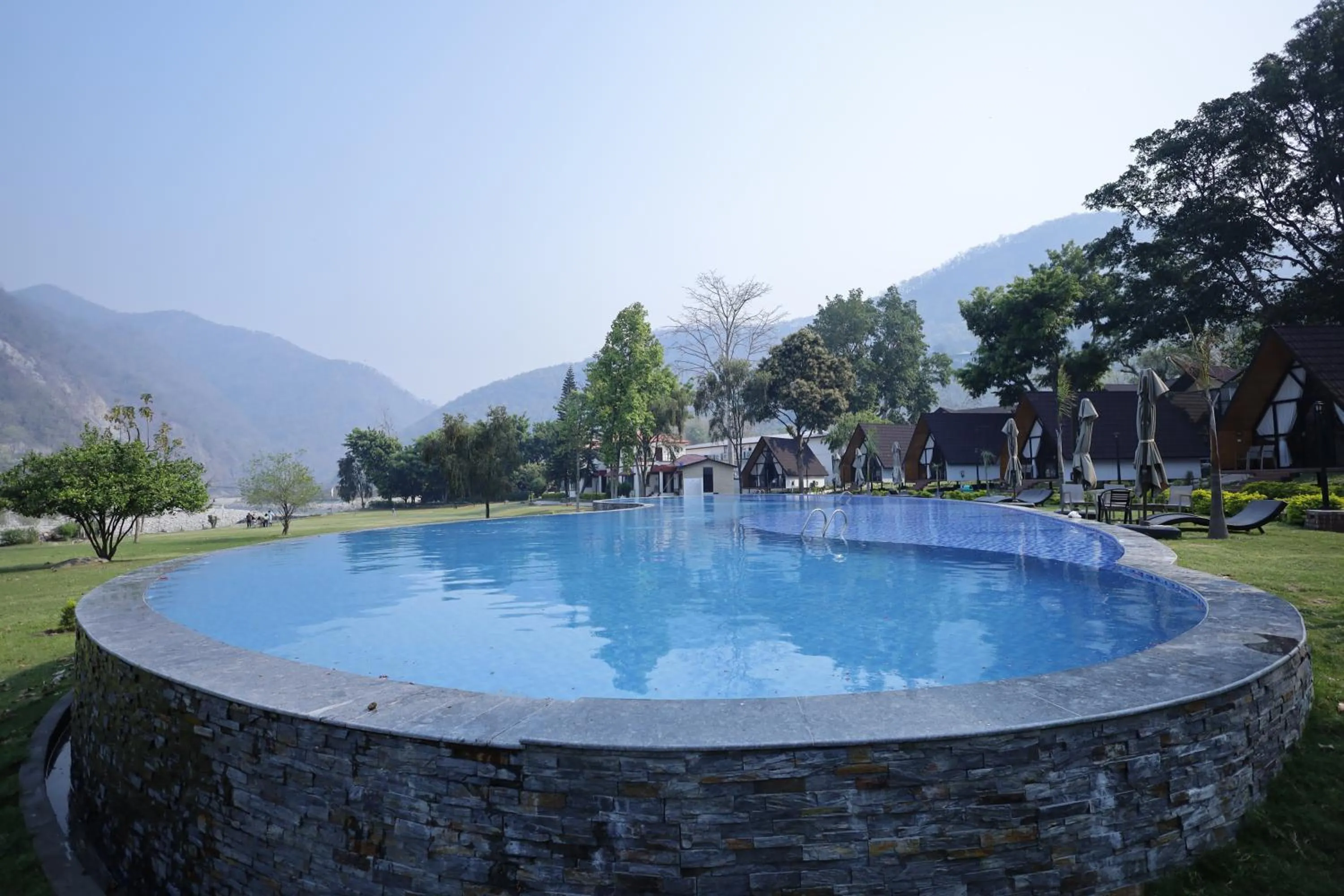 Swimming pool in WelcomHeritage Tarangi Ramganga Resort