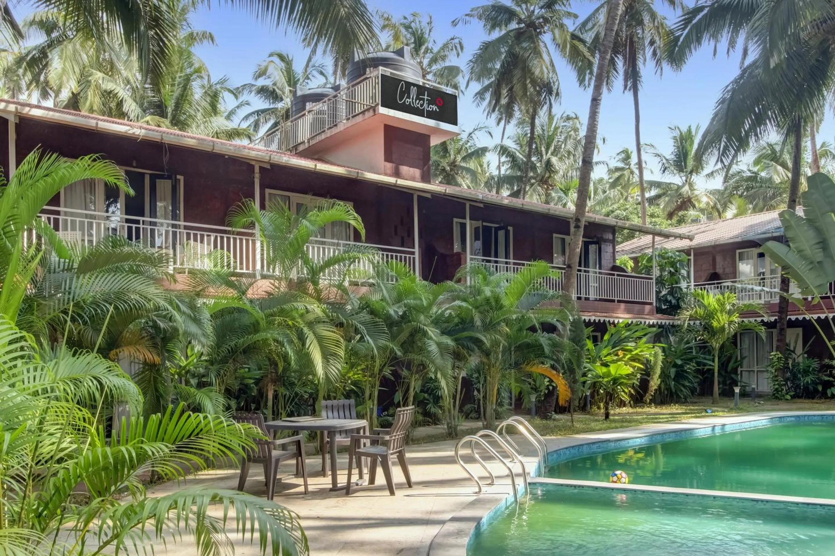 Facade/entrance in Capital O Coco Farm Resort