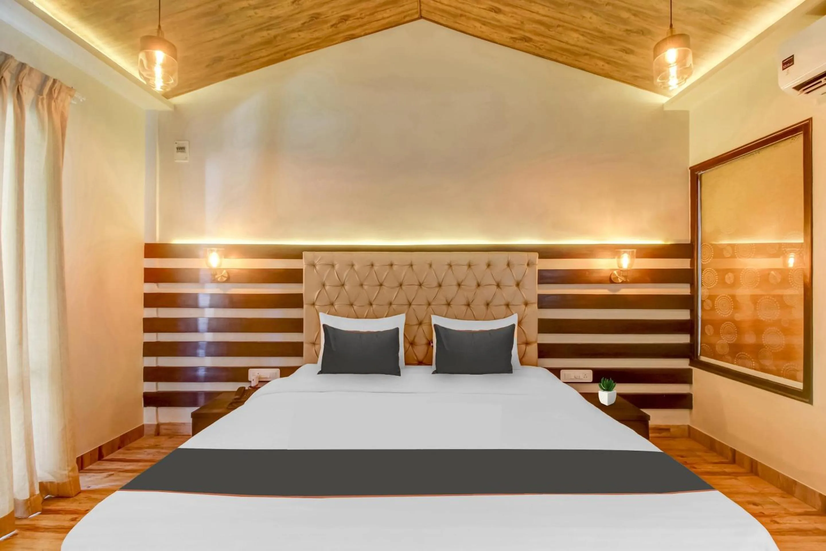 Bedroom, Bed in Capital O Coco Farm Resort