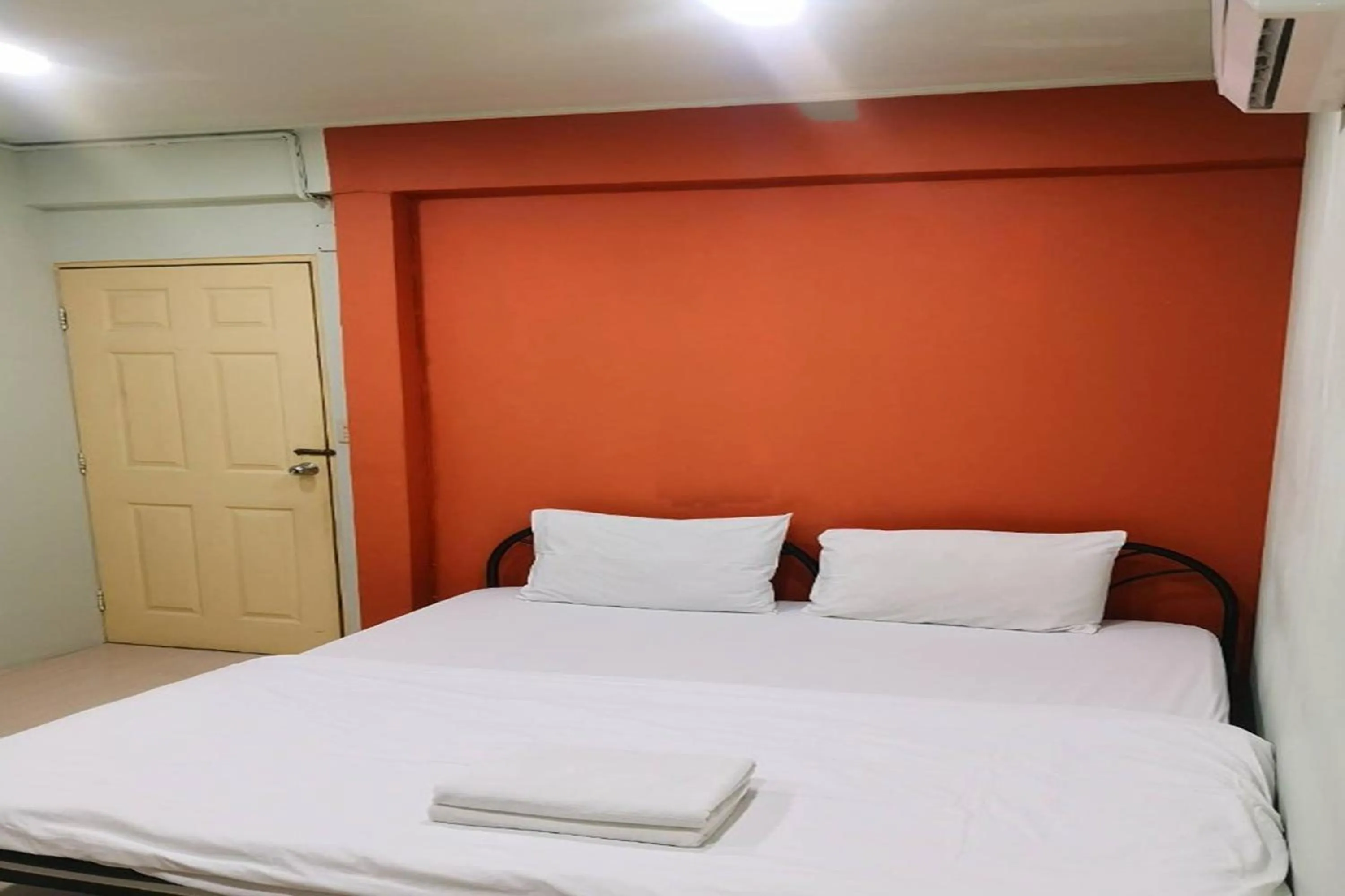 Bed in Freesia Saladaeng Silom Apartments