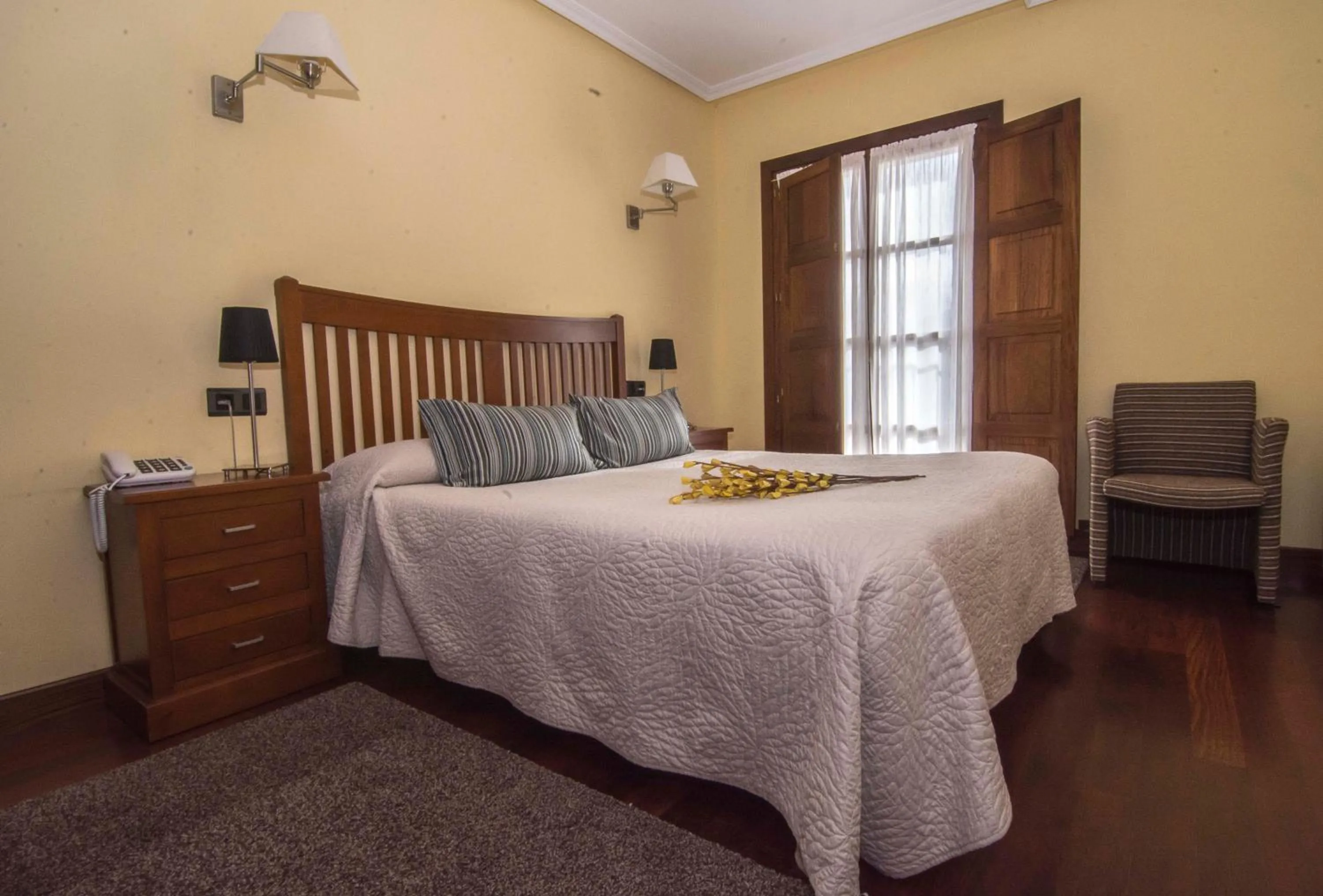 Photo of the whole room, Bed in Hotel Puerta Del Oriente