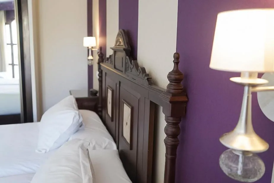 Bed in Hotel Rosaleda Don Pedro