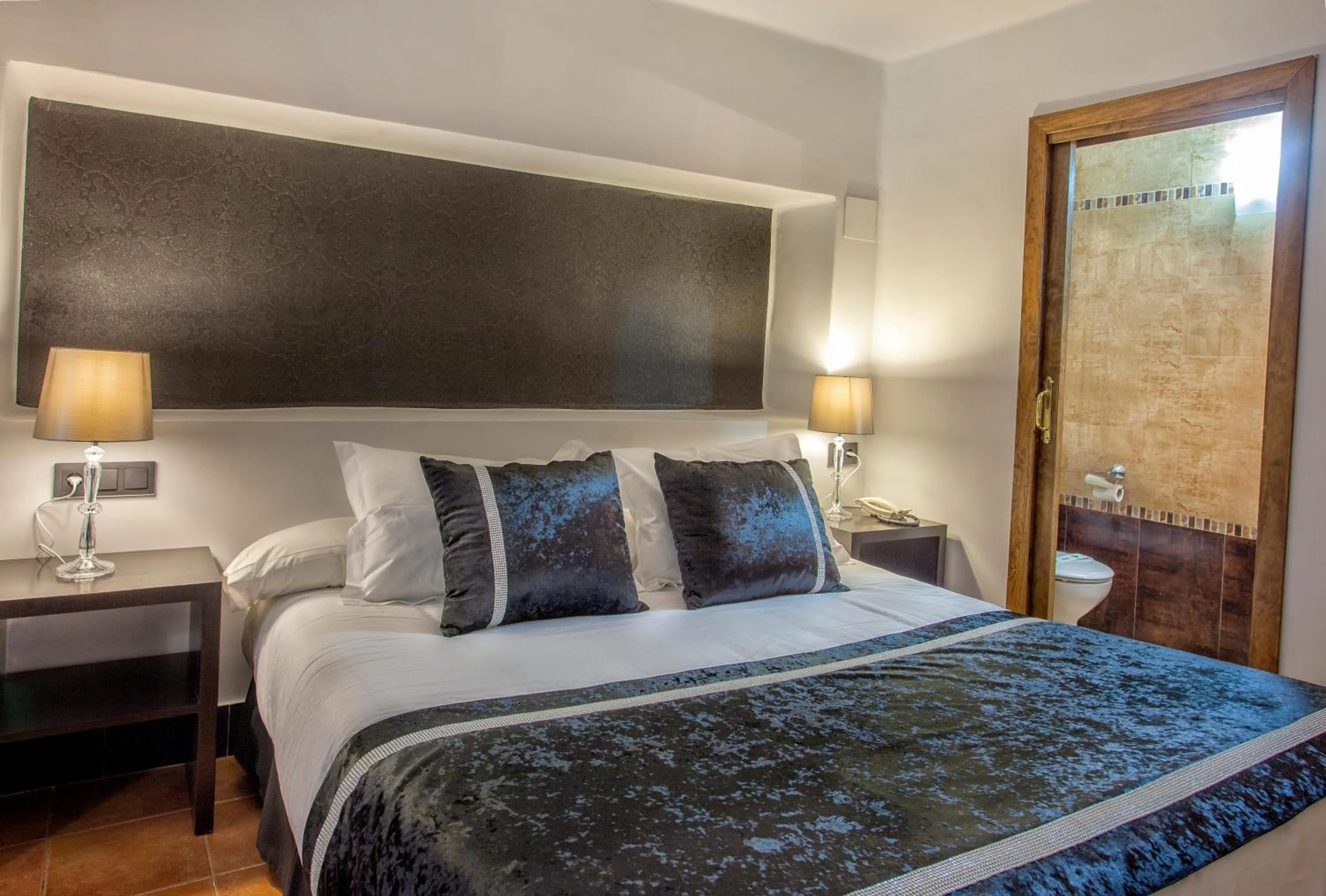 Decorative detail, Bed in Hotel Rosaleda Don Pedro