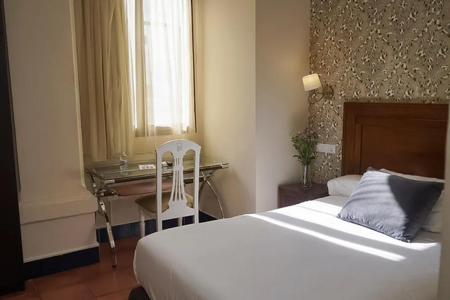 Bed in Hotel Rosaleda Don Pedro