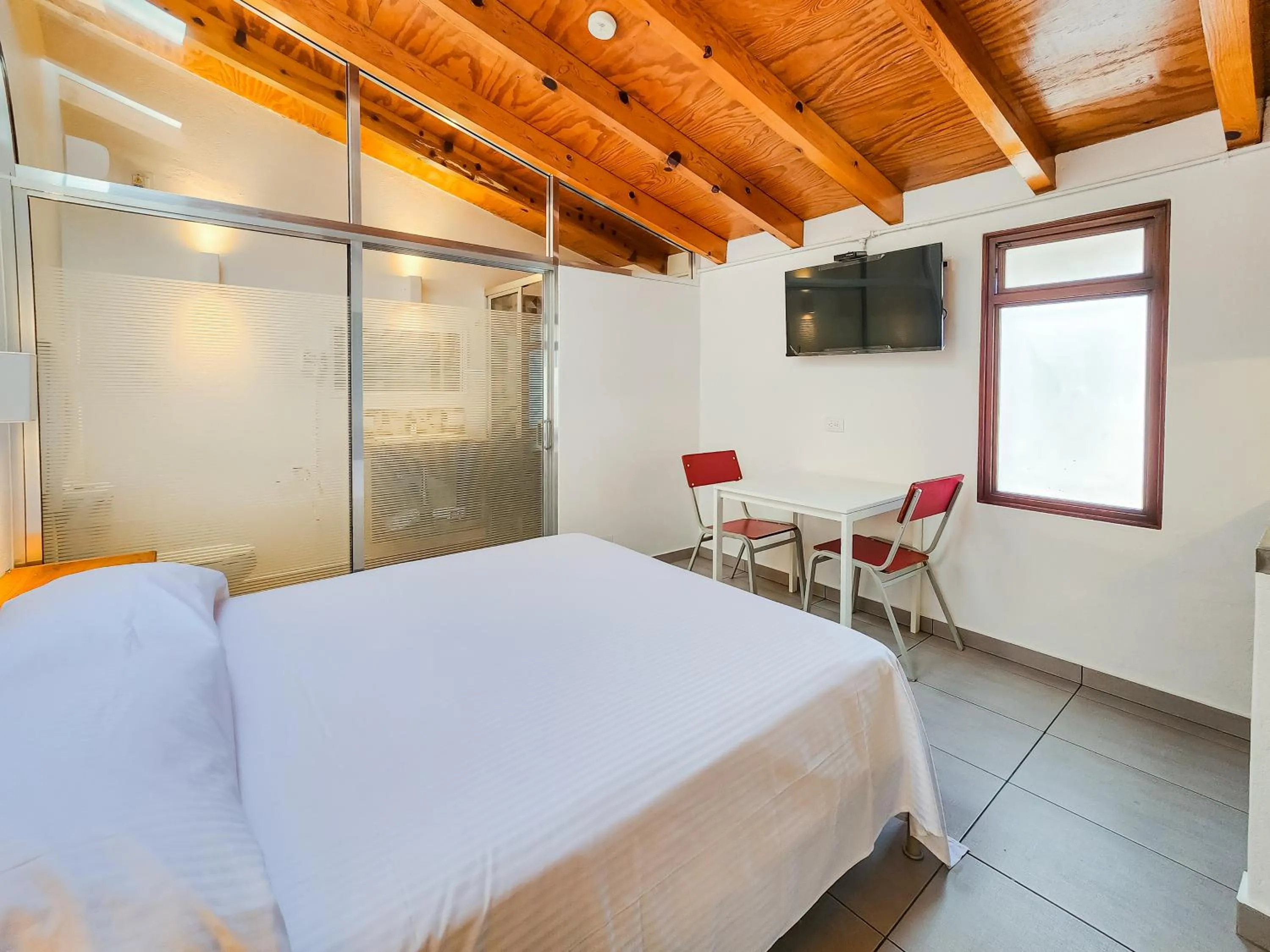 Bed in Niebla Suites