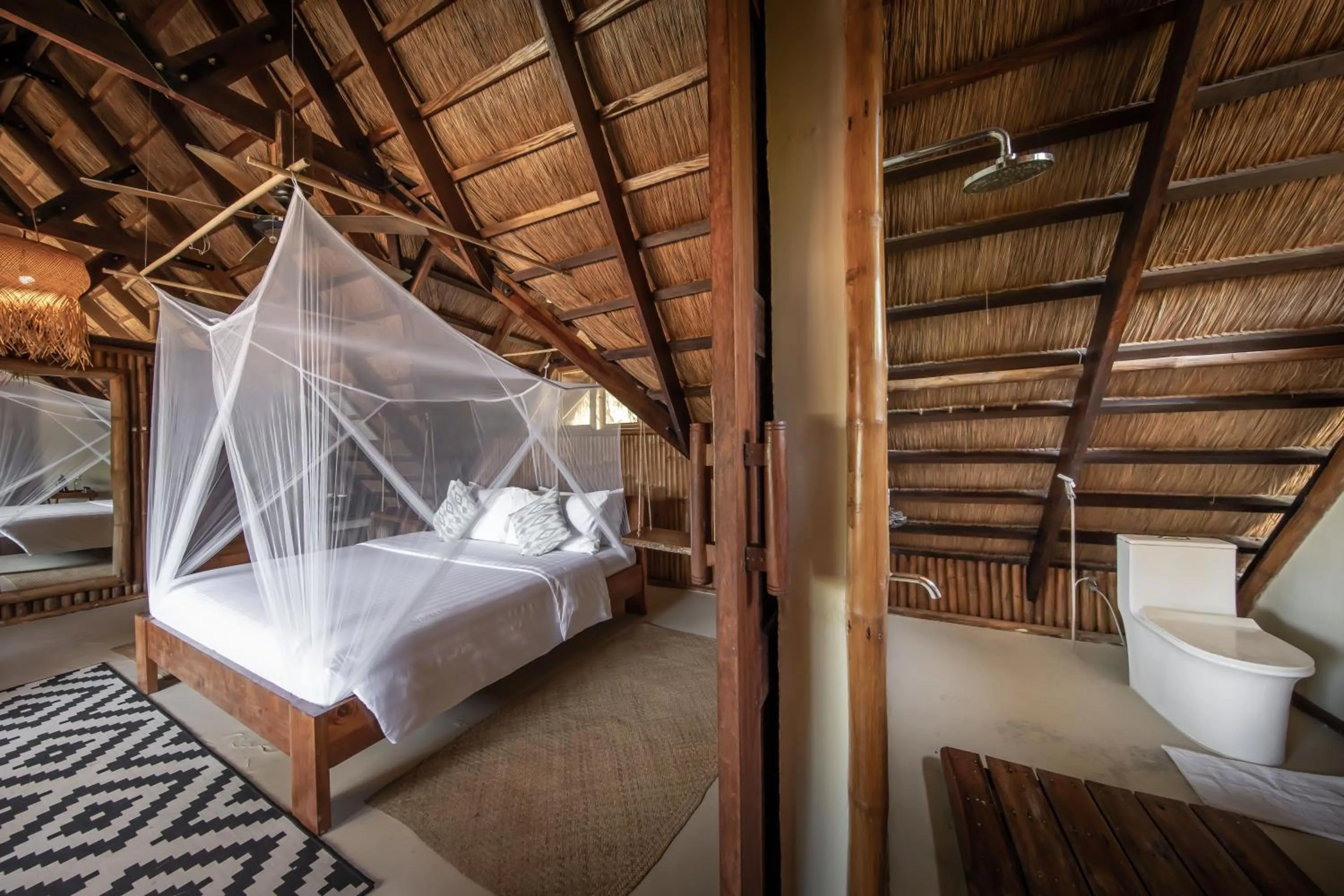 Bedroom, Bed in The Beach House Ocam Ocam