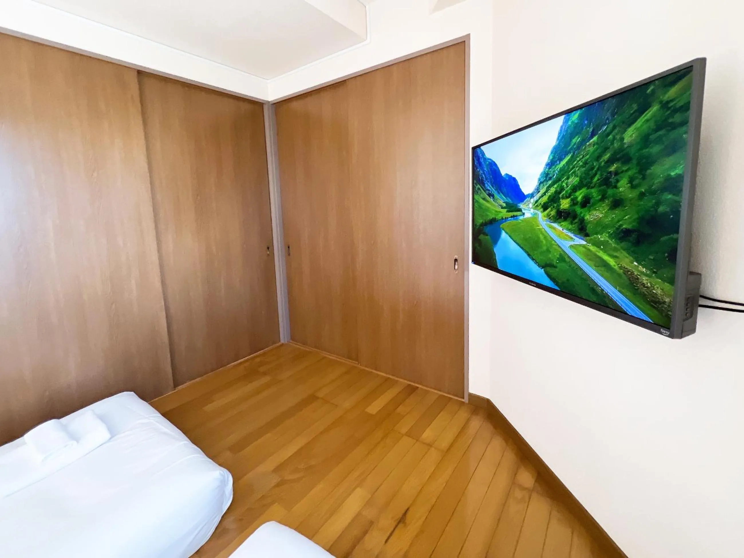 Bed in PINE TREE HOTEL