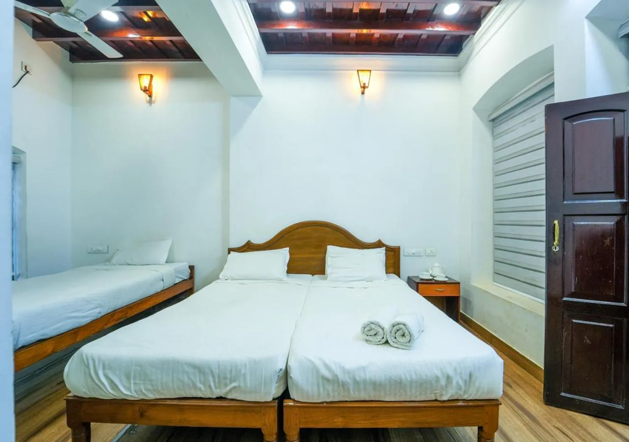 Photo of the whole room, Bed in Pop Tavern Private Pool Villa Kovalam by VOYE HOMES