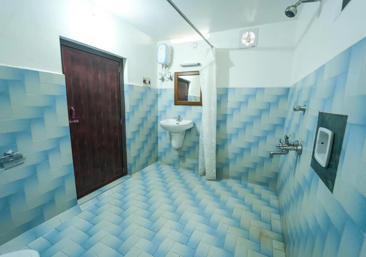 Shower in Pop Tavern Private Pool Villa Kovalam by VOYE HOMES