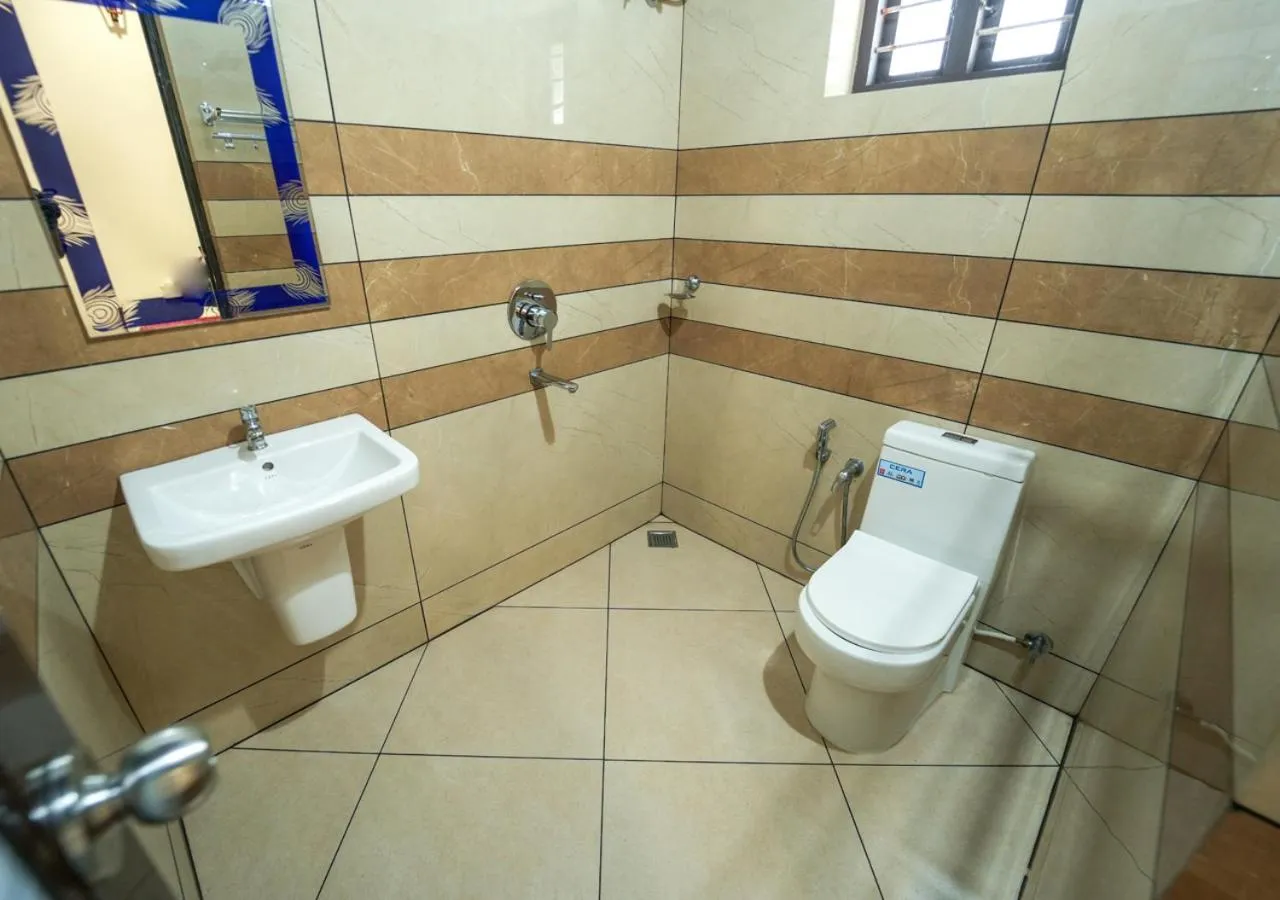 Shower in Pop Tavern Private Pool Villa Kovalam by VOYE HOMES