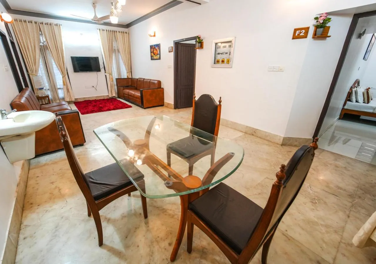 Seating area in Pop Tavern Private Pool Villa Kovalam by VOYE HOMES