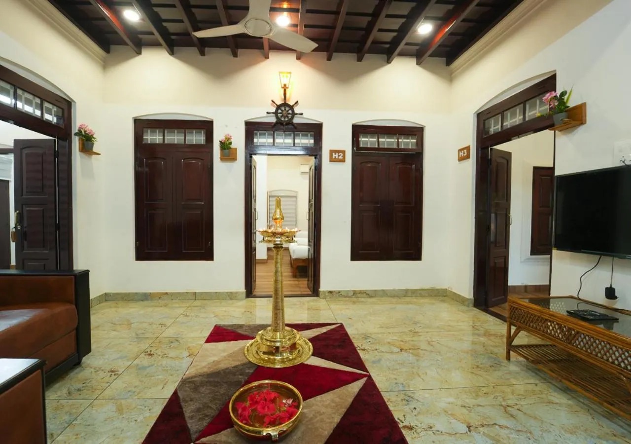 Communal lounge/ TV room in Pop Tavern Private Pool Villa Kovalam by VOYE HOMES