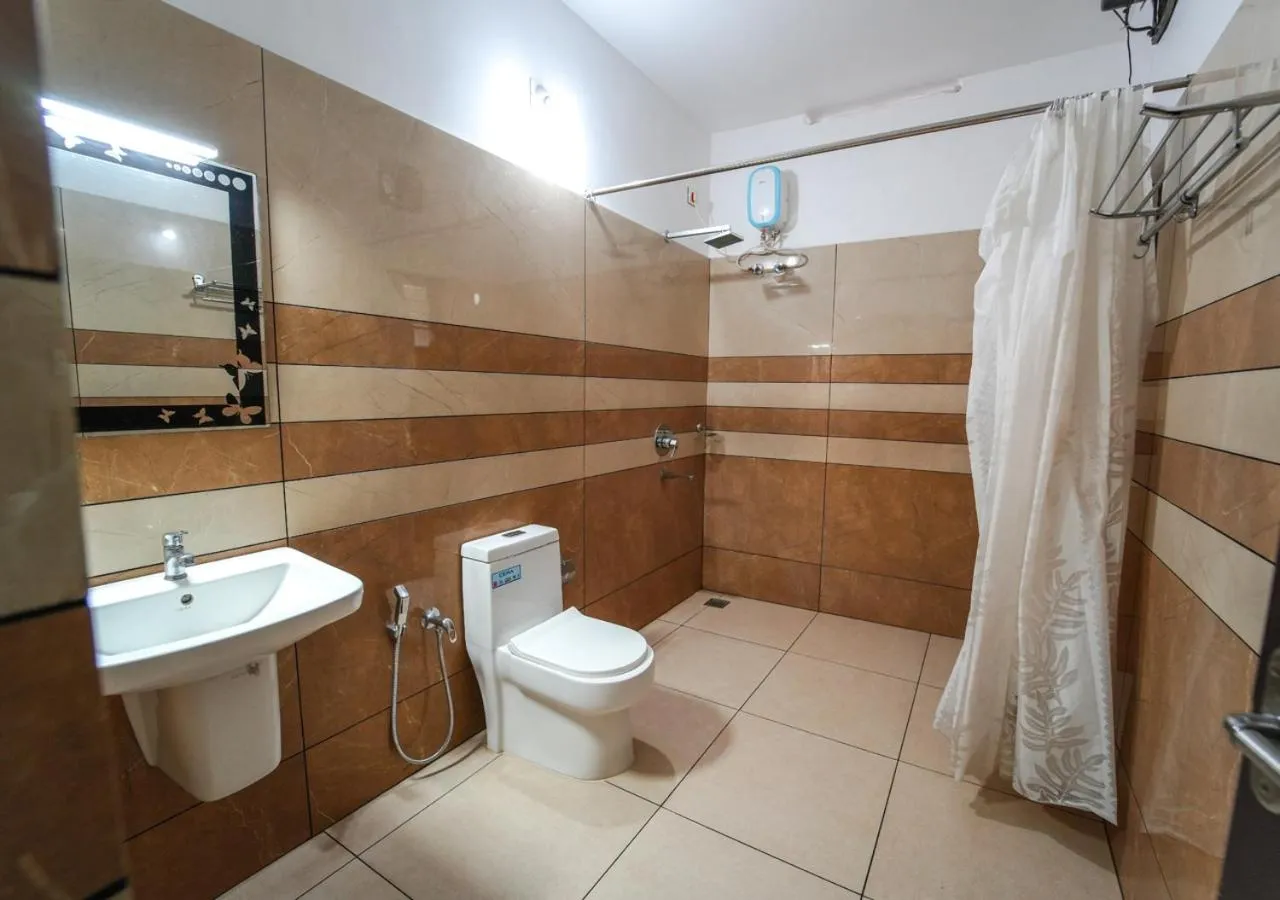 bidet in Pop Tavern Private Pool Villa Kovalam by VOYE HOMES