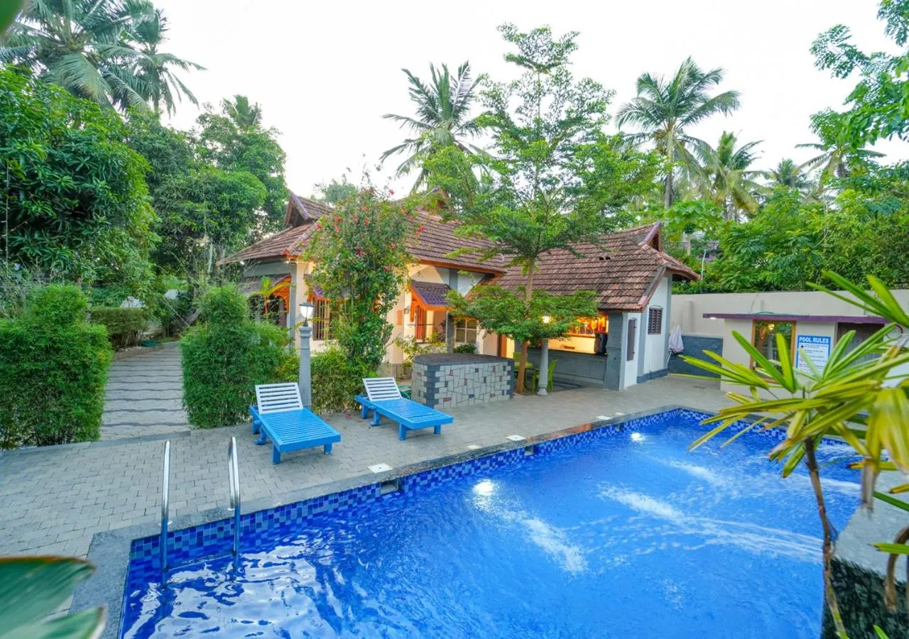 Property building in Pop Tavern Private Pool Villa Kovalam by VOYE HOMES