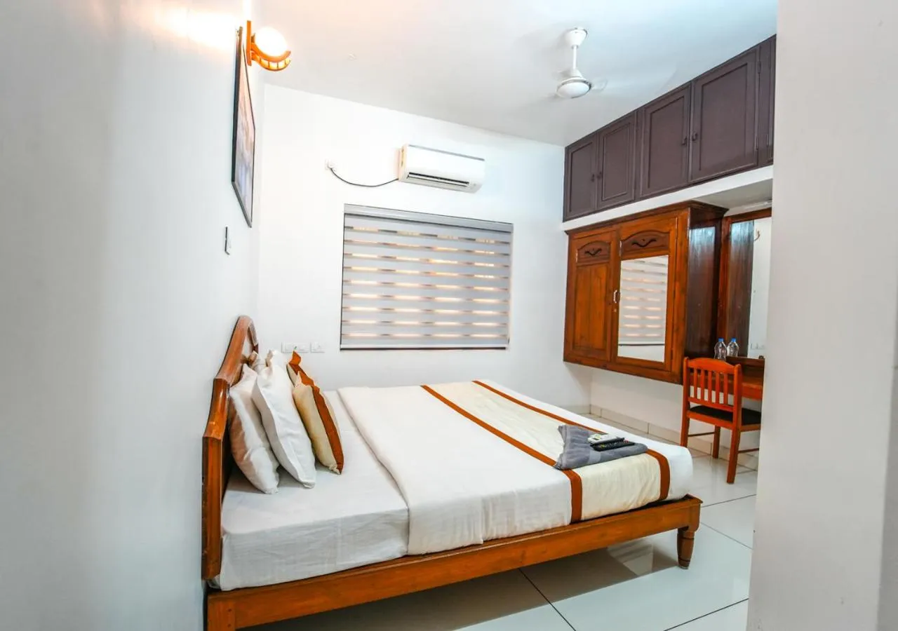 towels, Bed in Pop Tavern Private Pool Villa Kovalam by VOYE HOMES