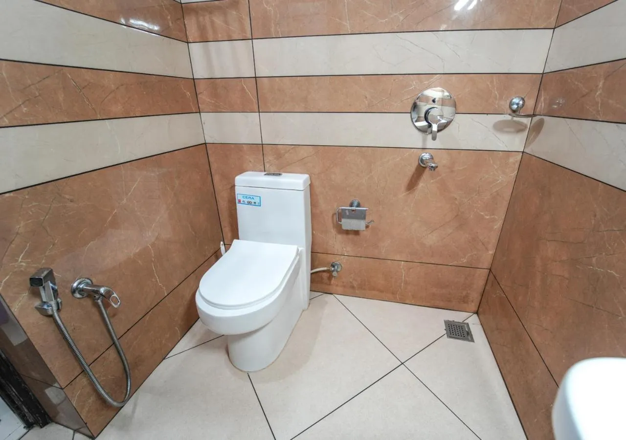 Shower in Pop Tavern Private Pool Villa Kovalam by VOYE HOMES