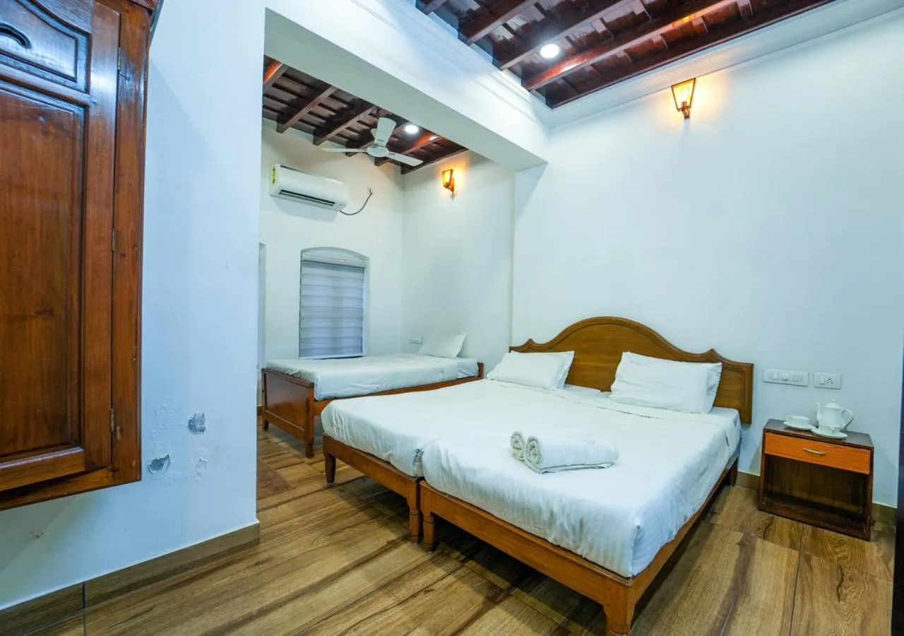 Photo of the whole room, Bed in Pop Tavern Private Pool Villa Kovalam by VOYE HOMES