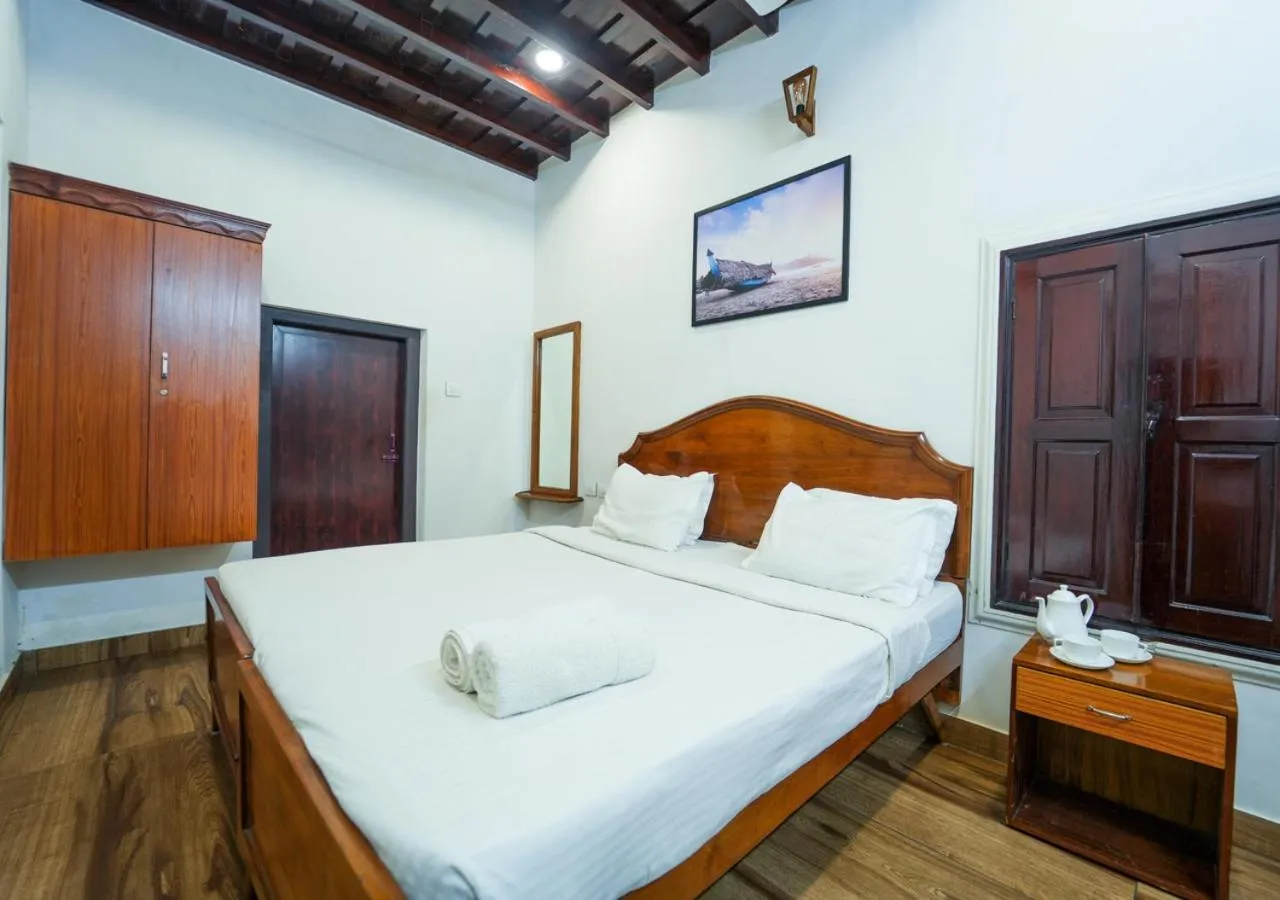 Photo of the whole room, Bed in Pop Tavern Private Pool Villa Kovalam by VOYE HOMES