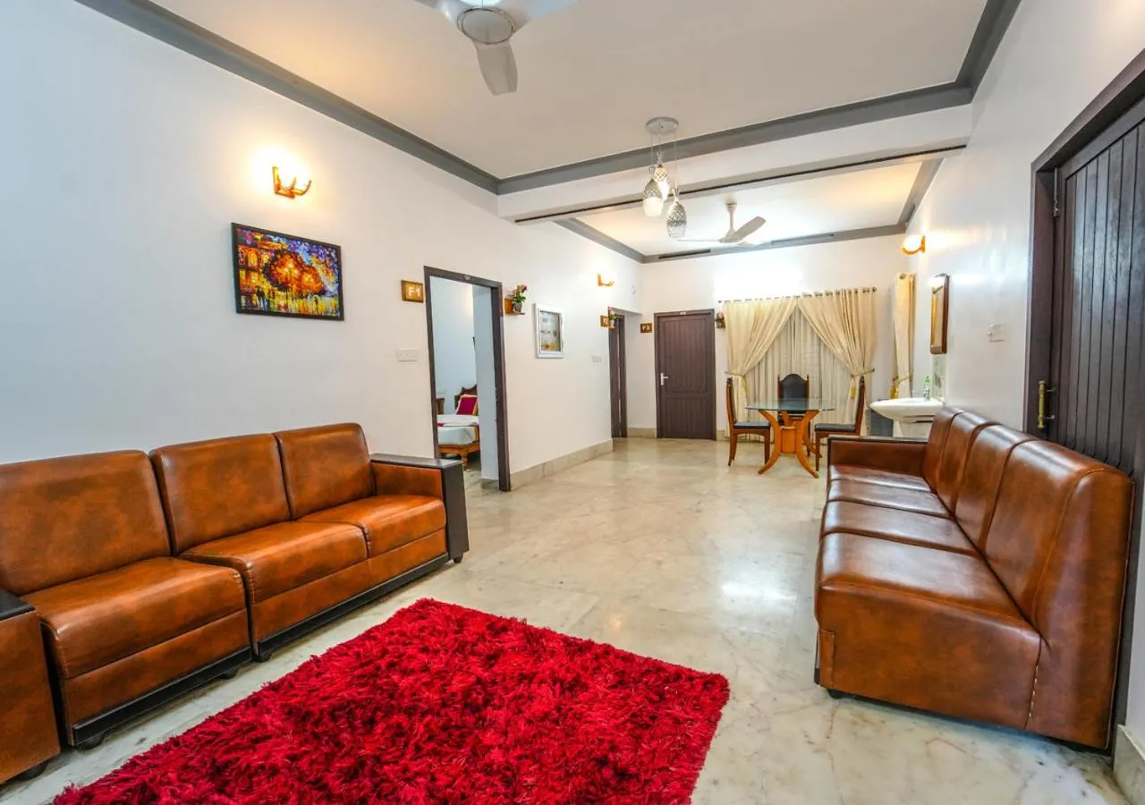 Living room in Pop Tavern Private Pool Villa Kovalam by VOYE HOMES