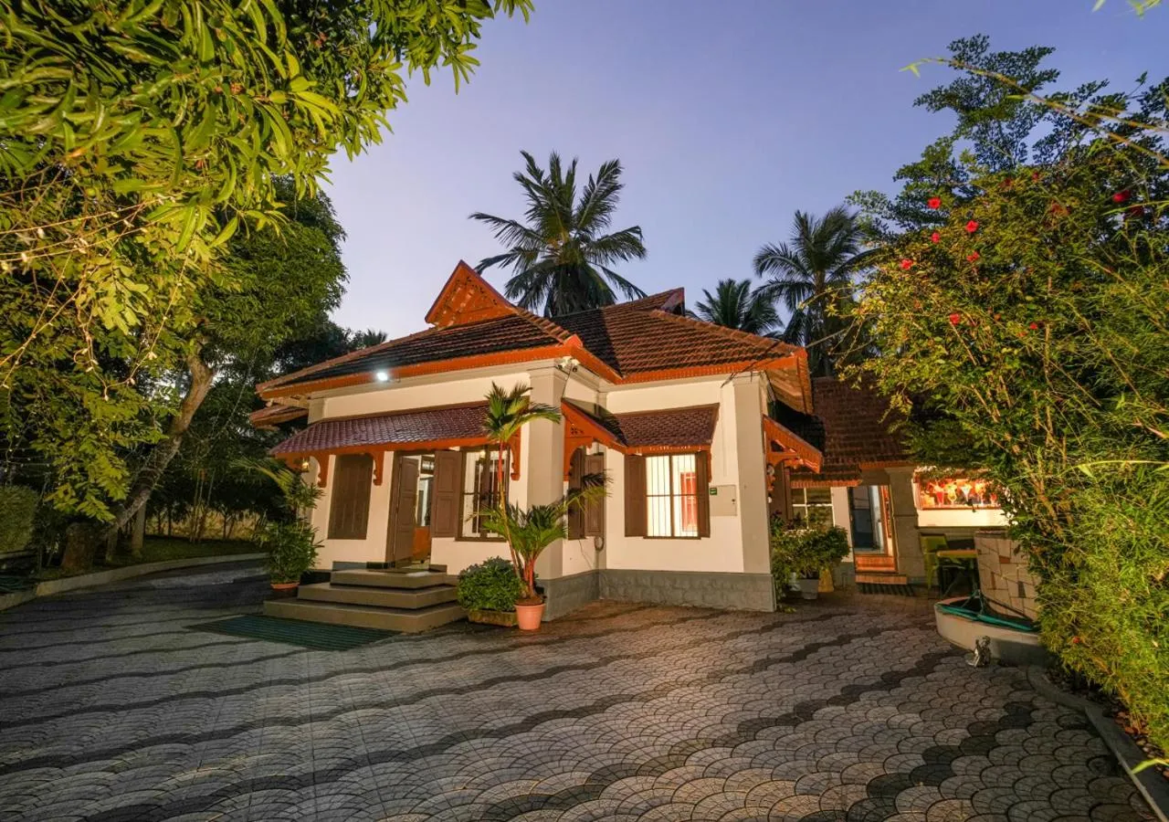 Property building in Pop Tavern Private Pool Villa Kovalam by VOYE HOMES