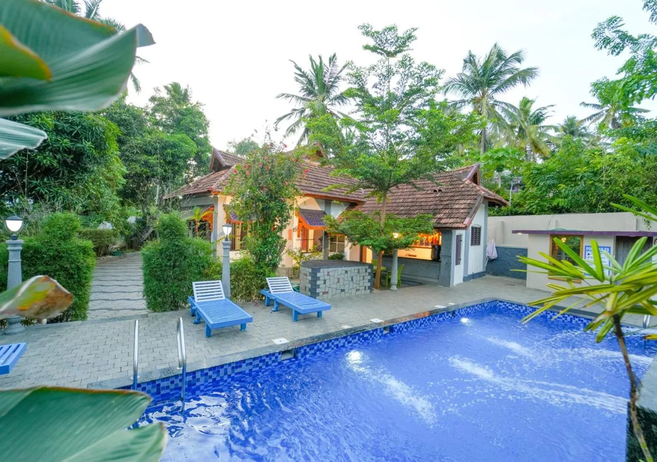 Swimming pool in Pop Tavern Private Pool Villa Kovalam by VOYE HOMES