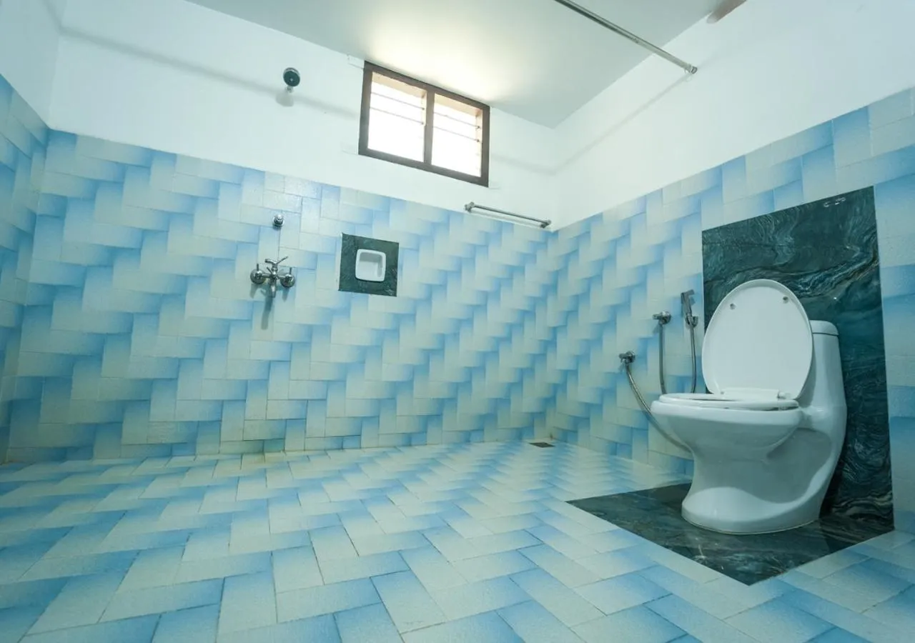 Toilet in Pop Tavern Private Pool Villa Kovalam by VOYE HOMES