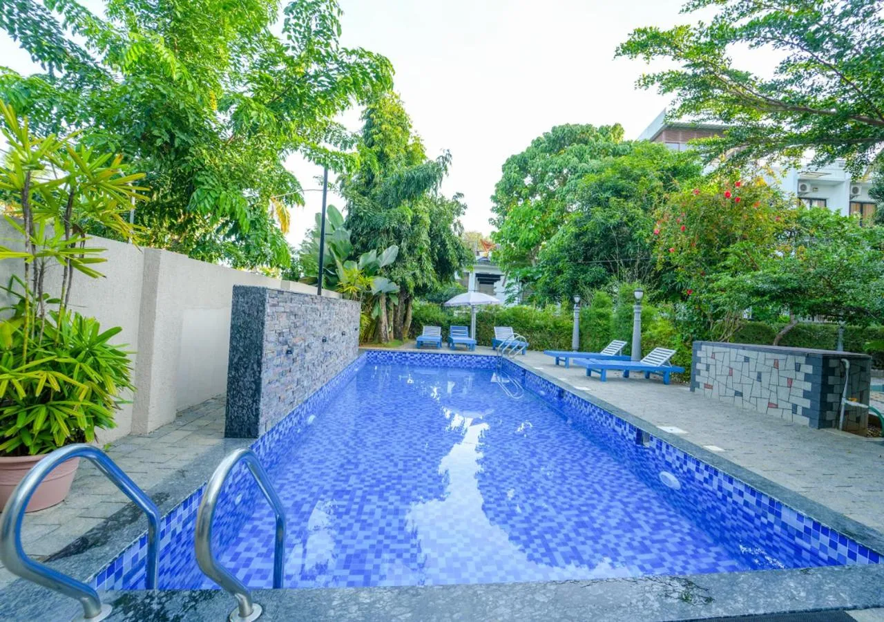 Swimming pool in Pop Tavern Private Pool Villa Kovalam by VOYE HOMES