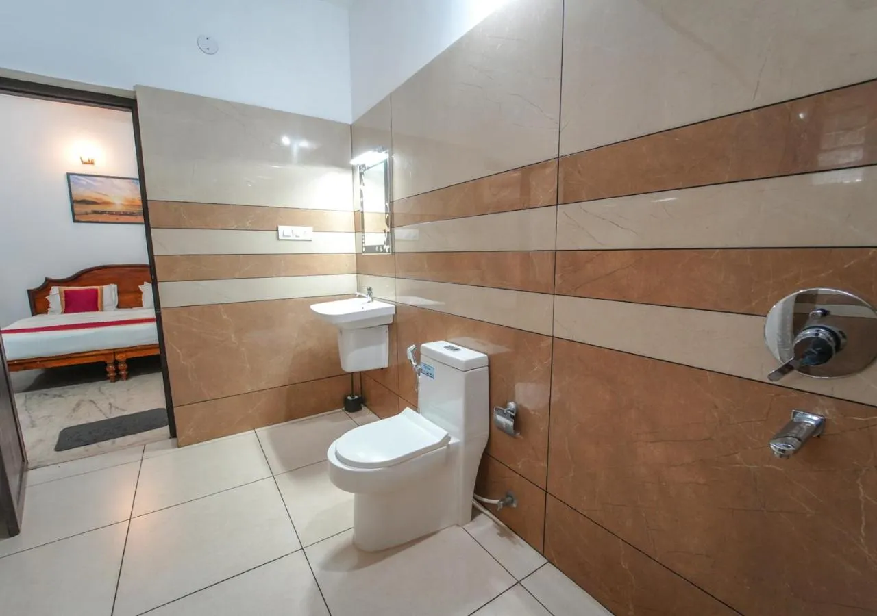 Shower in Pop Tavern Private Pool Villa Kovalam by VOYE HOMES