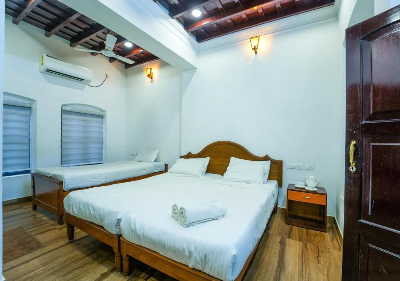 Photo of the whole room, Bed in Pop Tavern Private Pool Villa Kovalam by VOYE HOMES