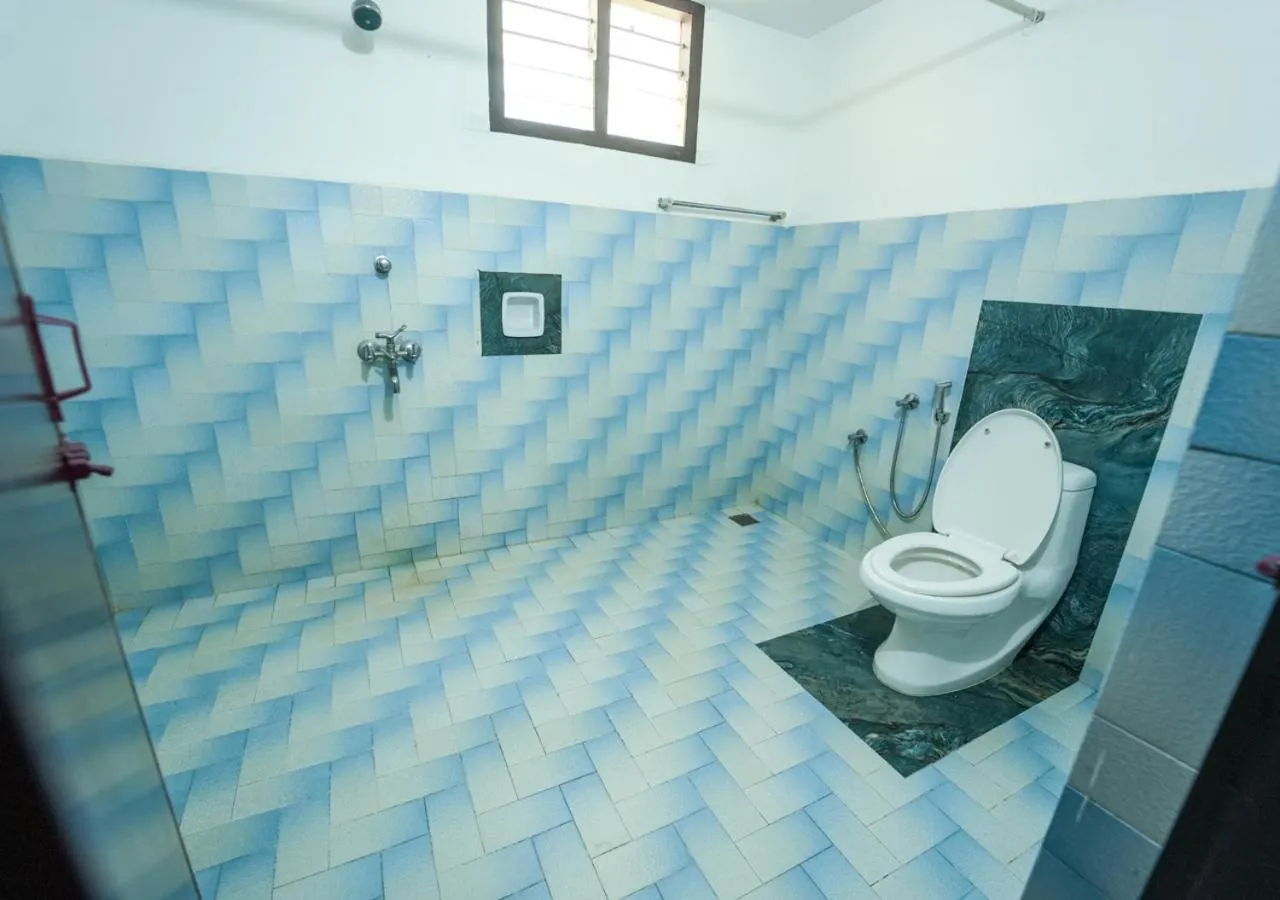 Toilet in Pop Tavern Private Pool Villa Kovalam by VOYE HOMES