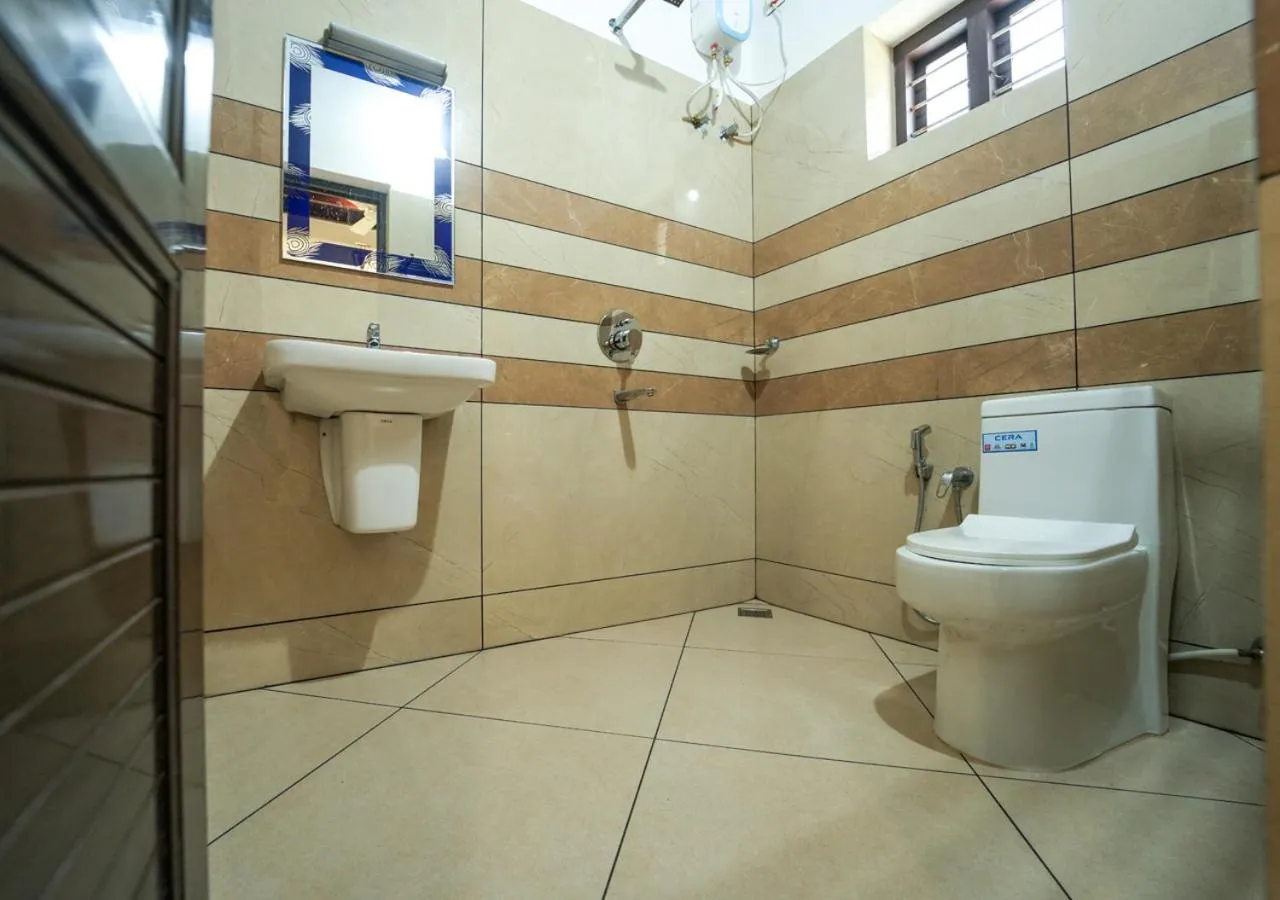 Bathroom in Pop Tavern Private Pool Villa Kovalam by VOYE HOMES