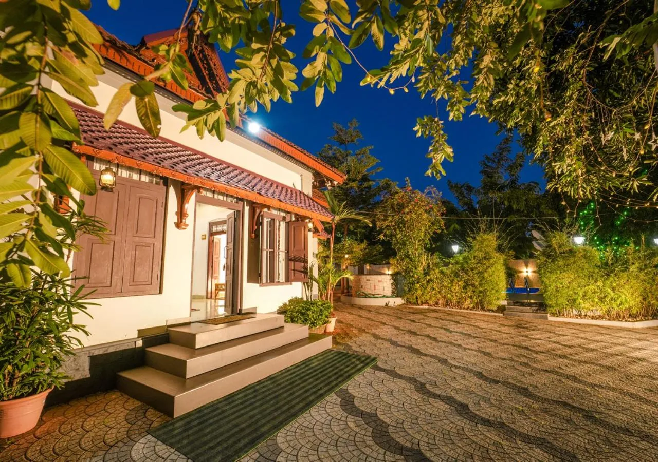 Property building in Pop Tavern Private Pool Villa Kovalam by VOYE HOMES