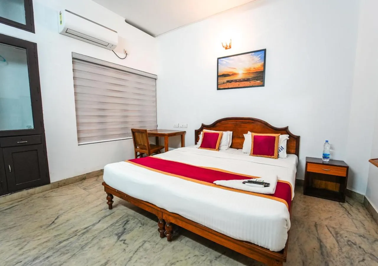 Bed in Pop Tavern Private Pool Villa Kovalam by VOYE HOMES