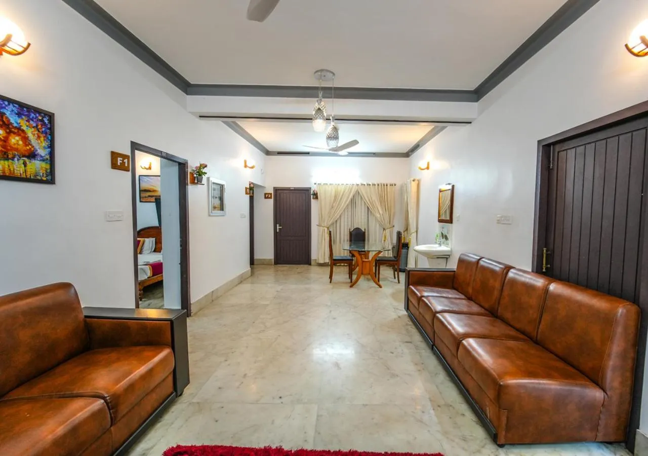 Living room in Pop Tavern Private Pool Villa Kovalam by VOYE HOMES