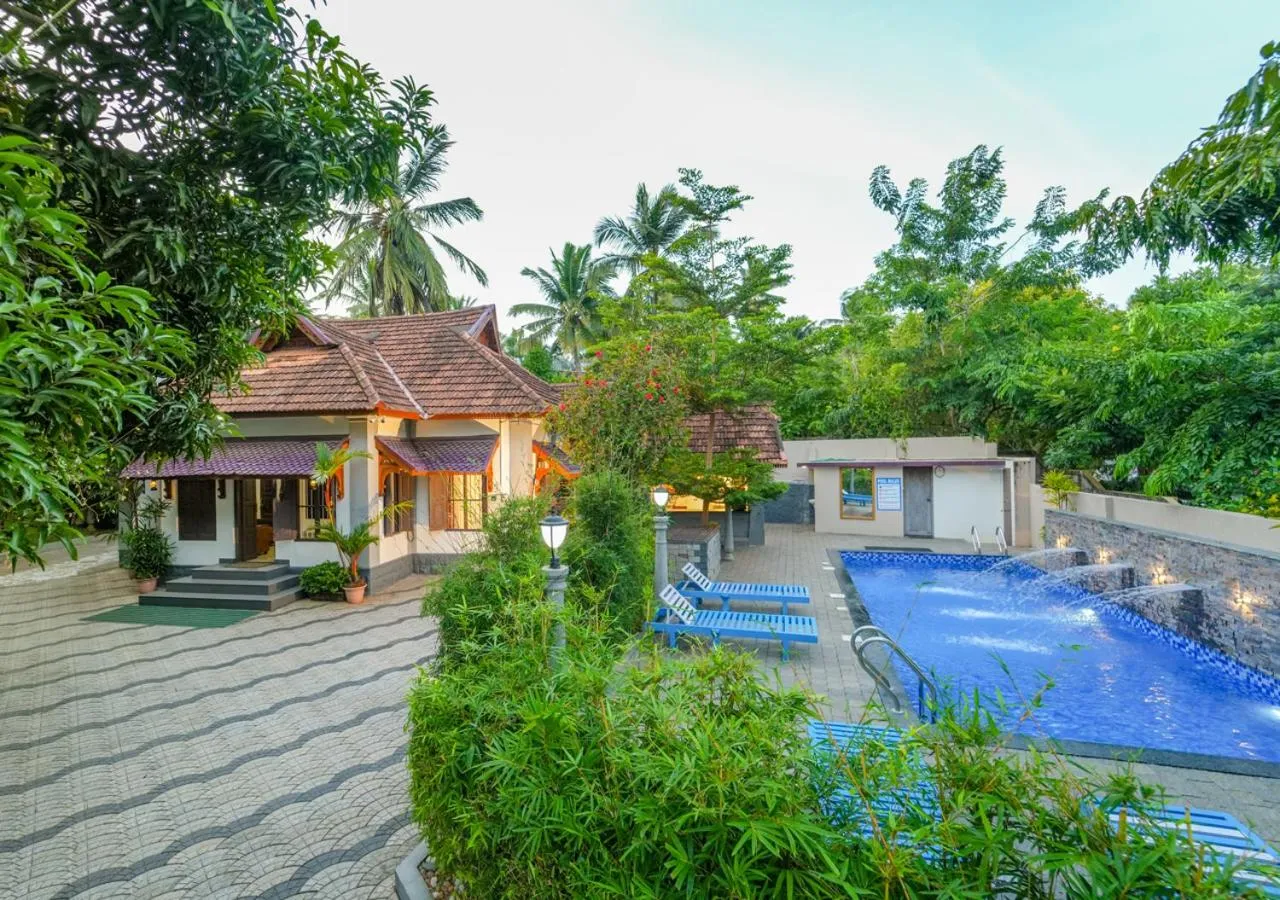 Property building in Pop Tavern Private Pool Villa Kovalam by VOYE HOMES