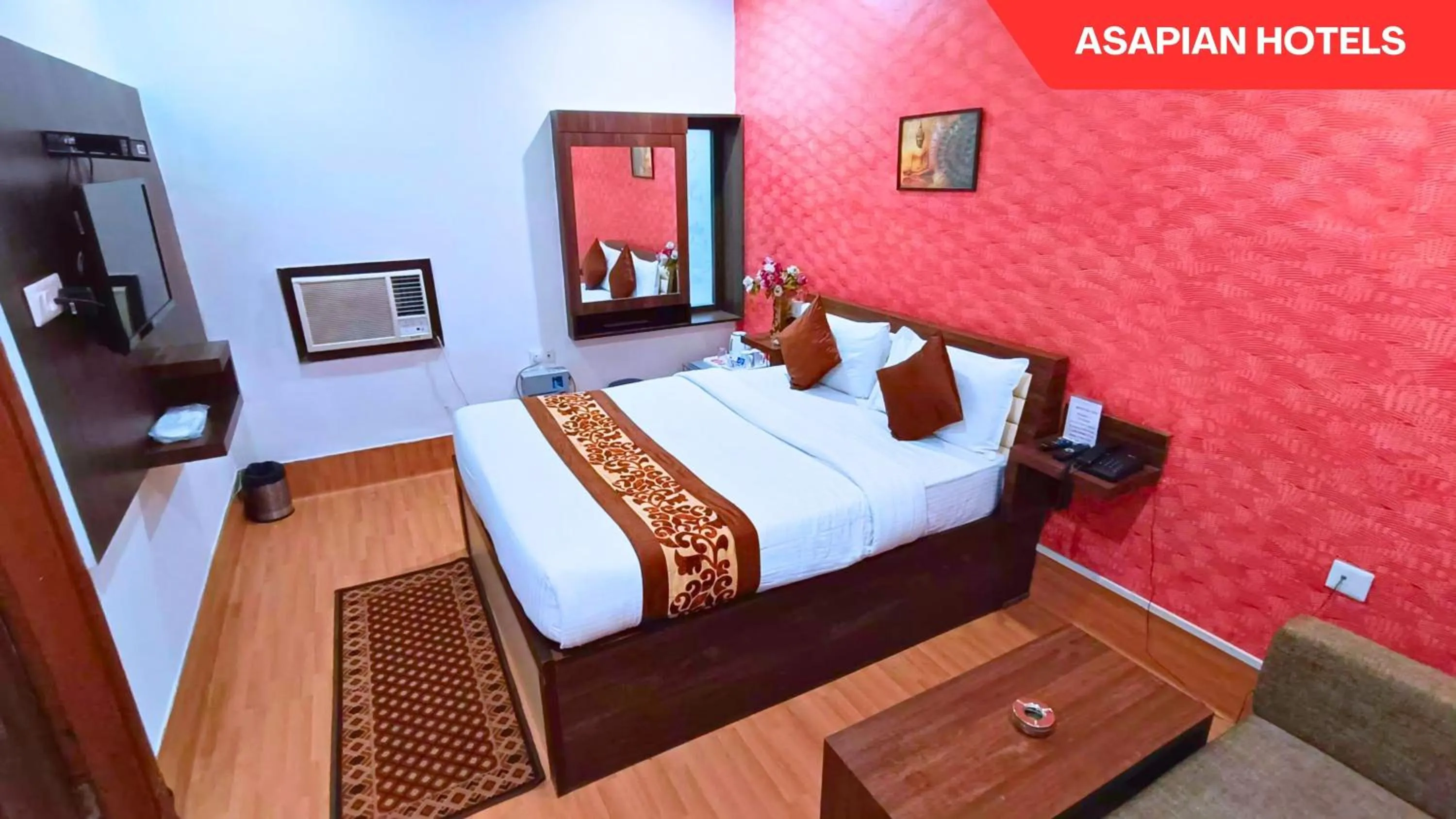 Bed in Hotel Vijay Deluxe