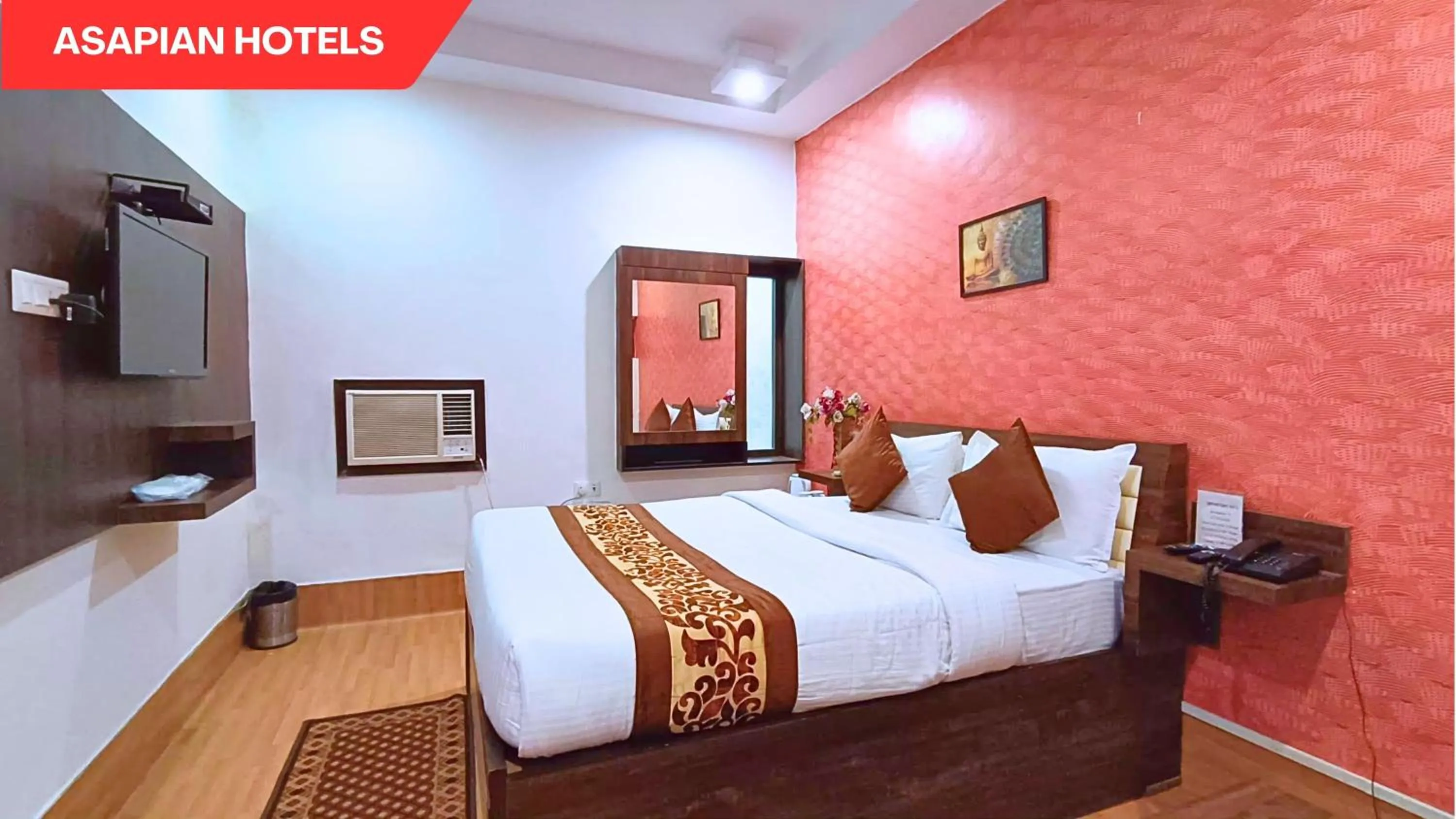 Bed in Hotel Vijay Deluxe