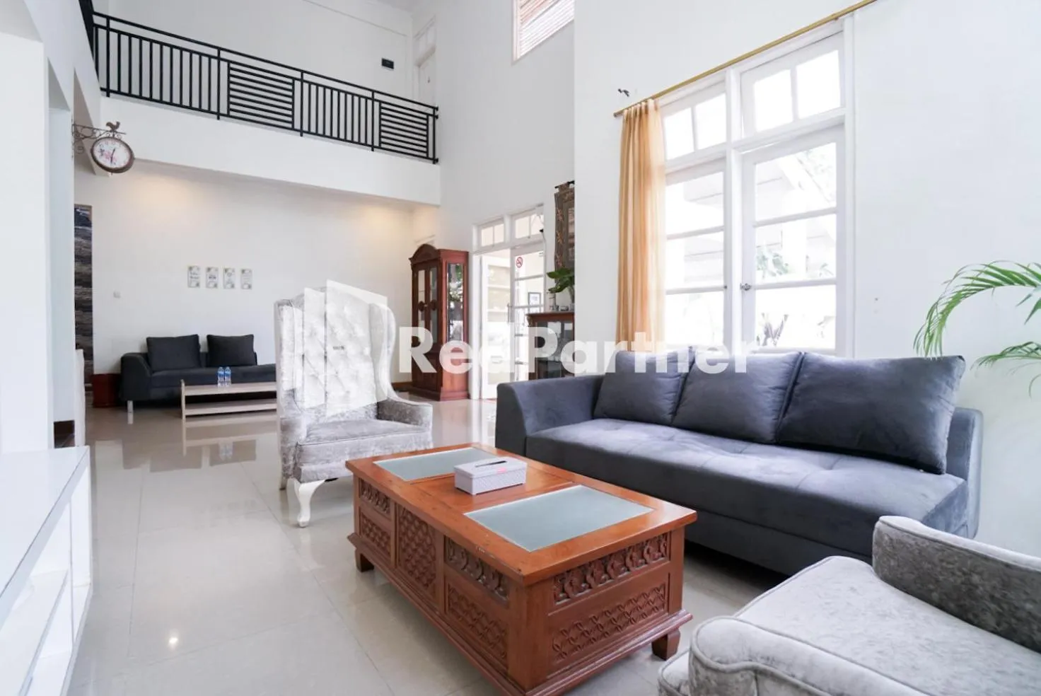 Living room in Fazza Syariah Mitra RedDoorz